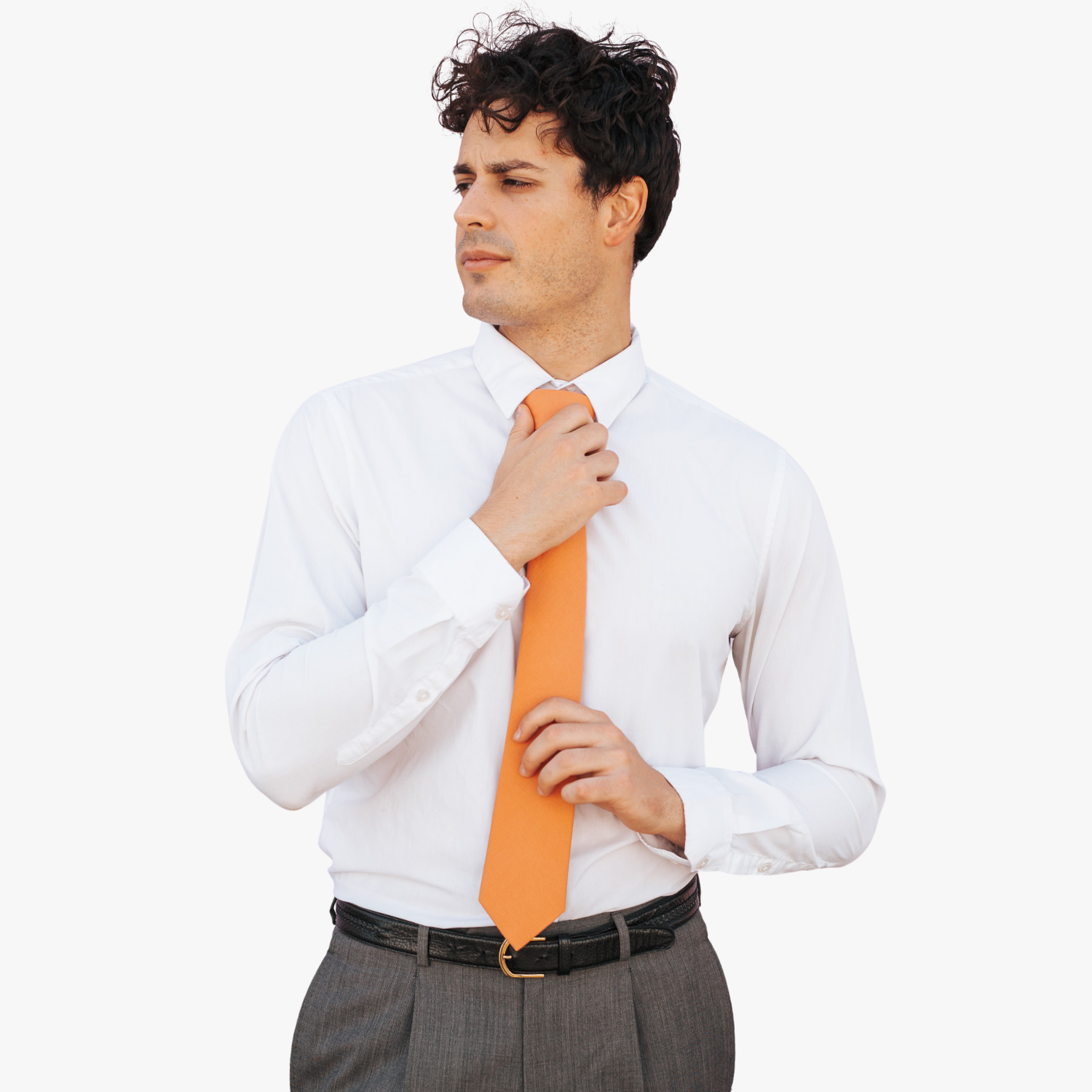 A man with a solid tie with a plain burnt orange salmon color.