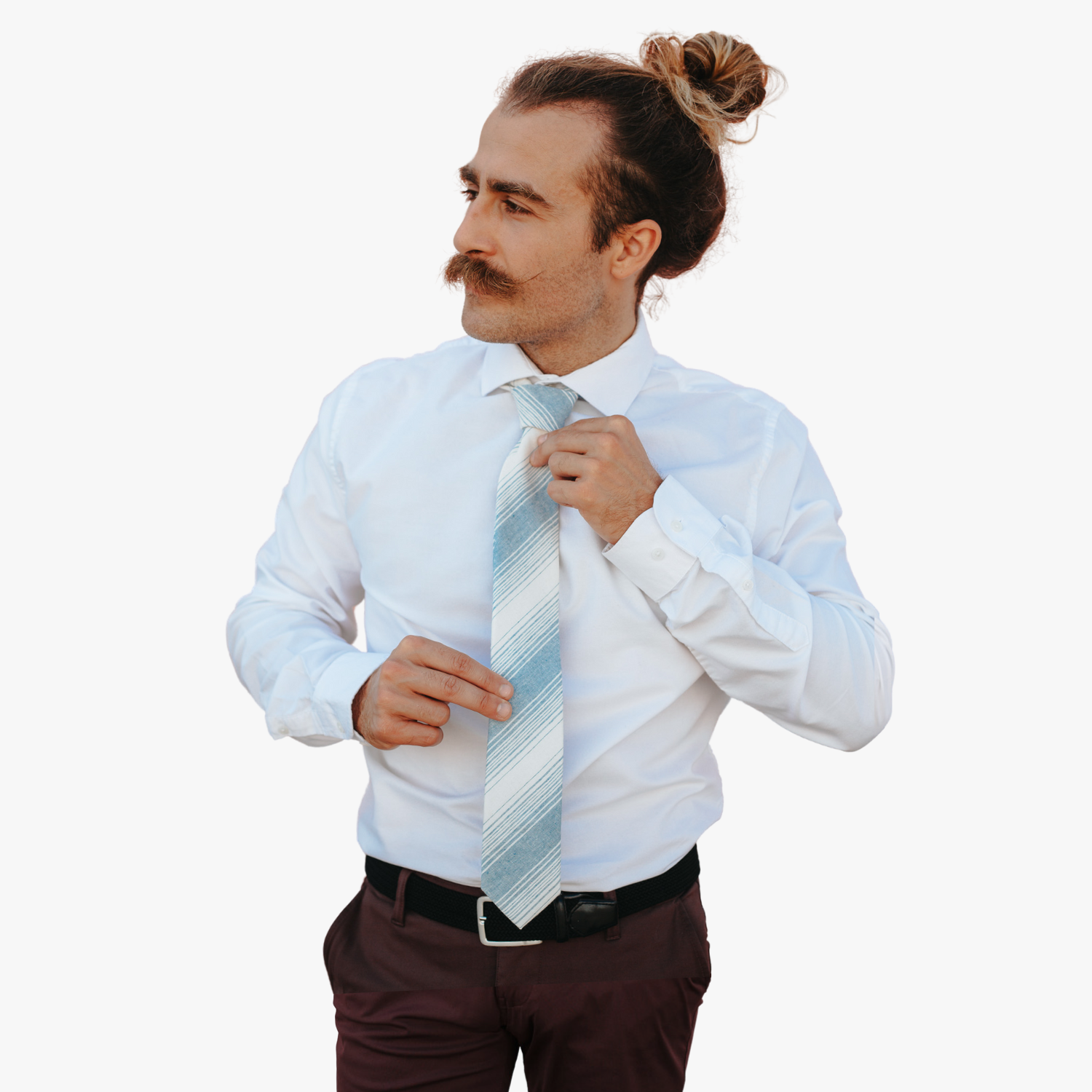 A man wearing a striped tie with light dusty blue stripe, thin beige cream lines,  and off-white diagonal designs.