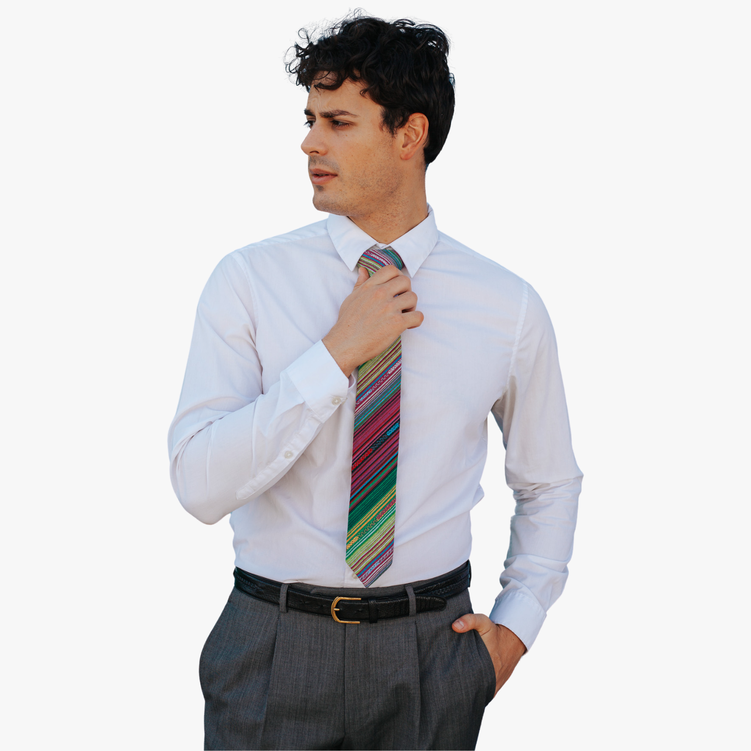 A man wearing a striped tie with green stripes, purple lines, yellow bars, blue designs and Mexican fiesta style.