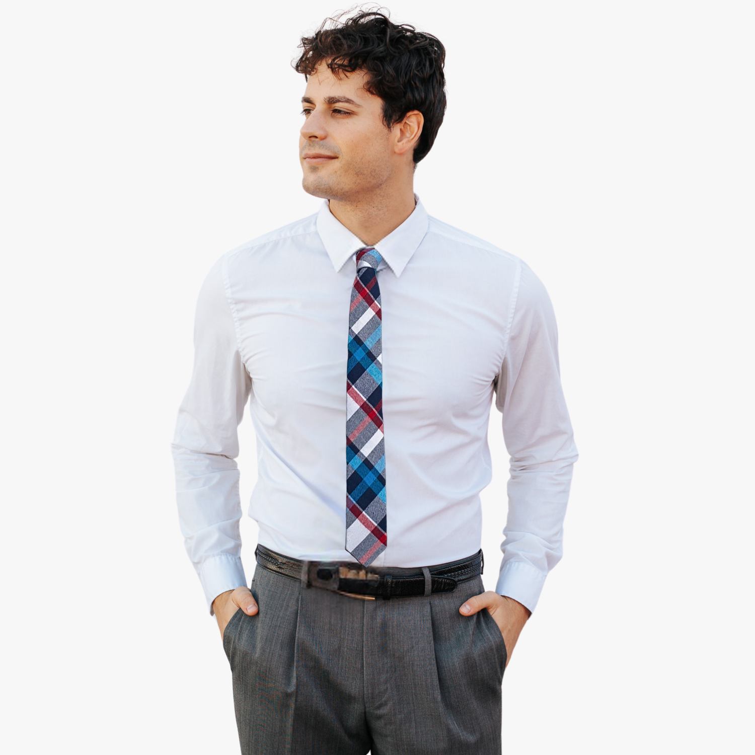 A man wearing a plaid tie with white fabric, thin red lines, turquoise bars, and colorful design.
