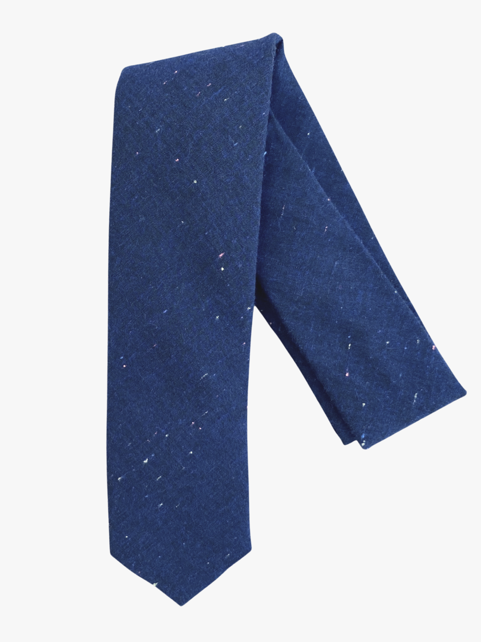 A folded solid speckled adult men's necktie with multi color spots and dots on navy fabric.