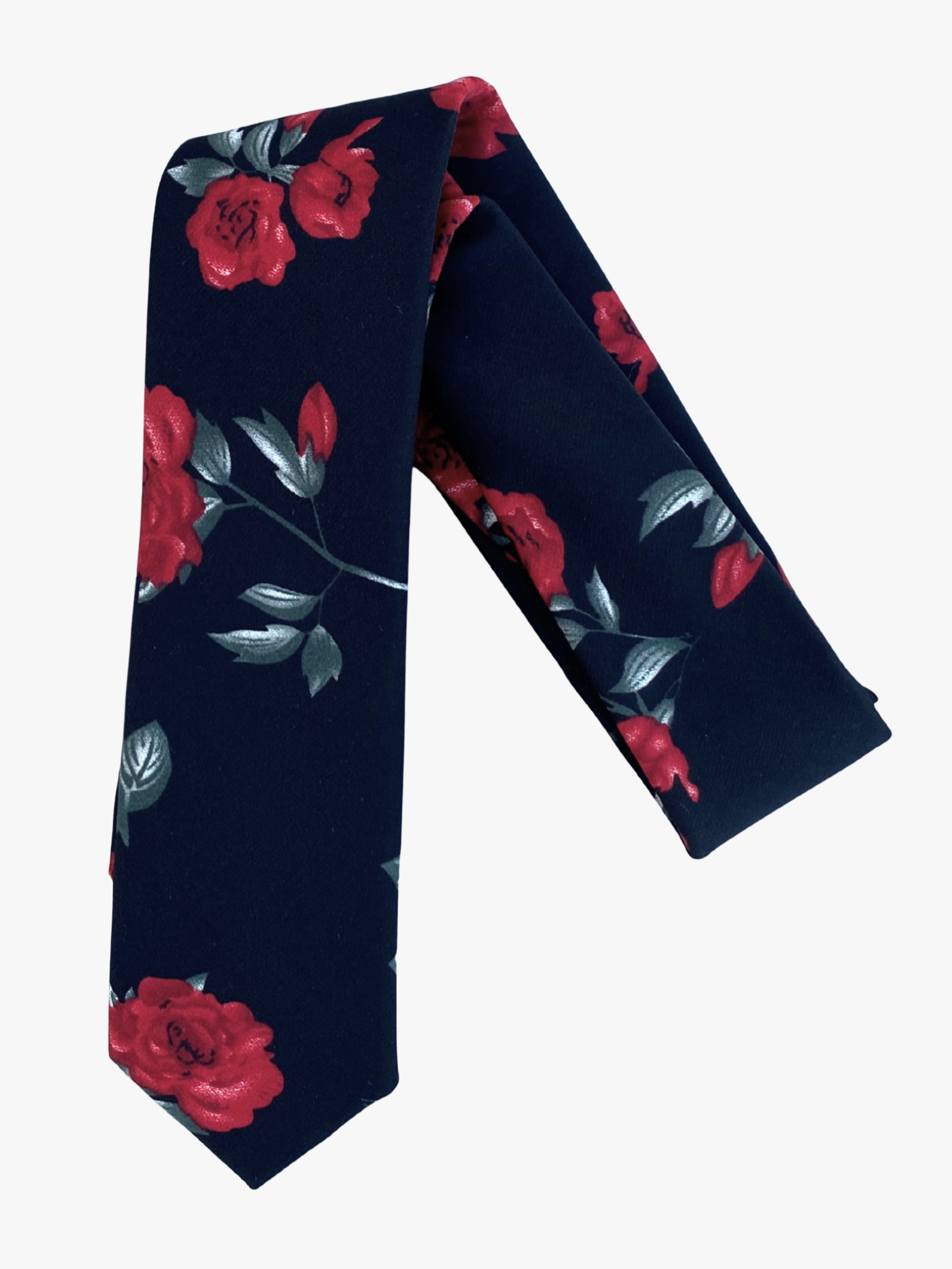 A folded Christmas floral adult men's necktie with red poinsettia flowers, pastel green leaves, and black fabric.