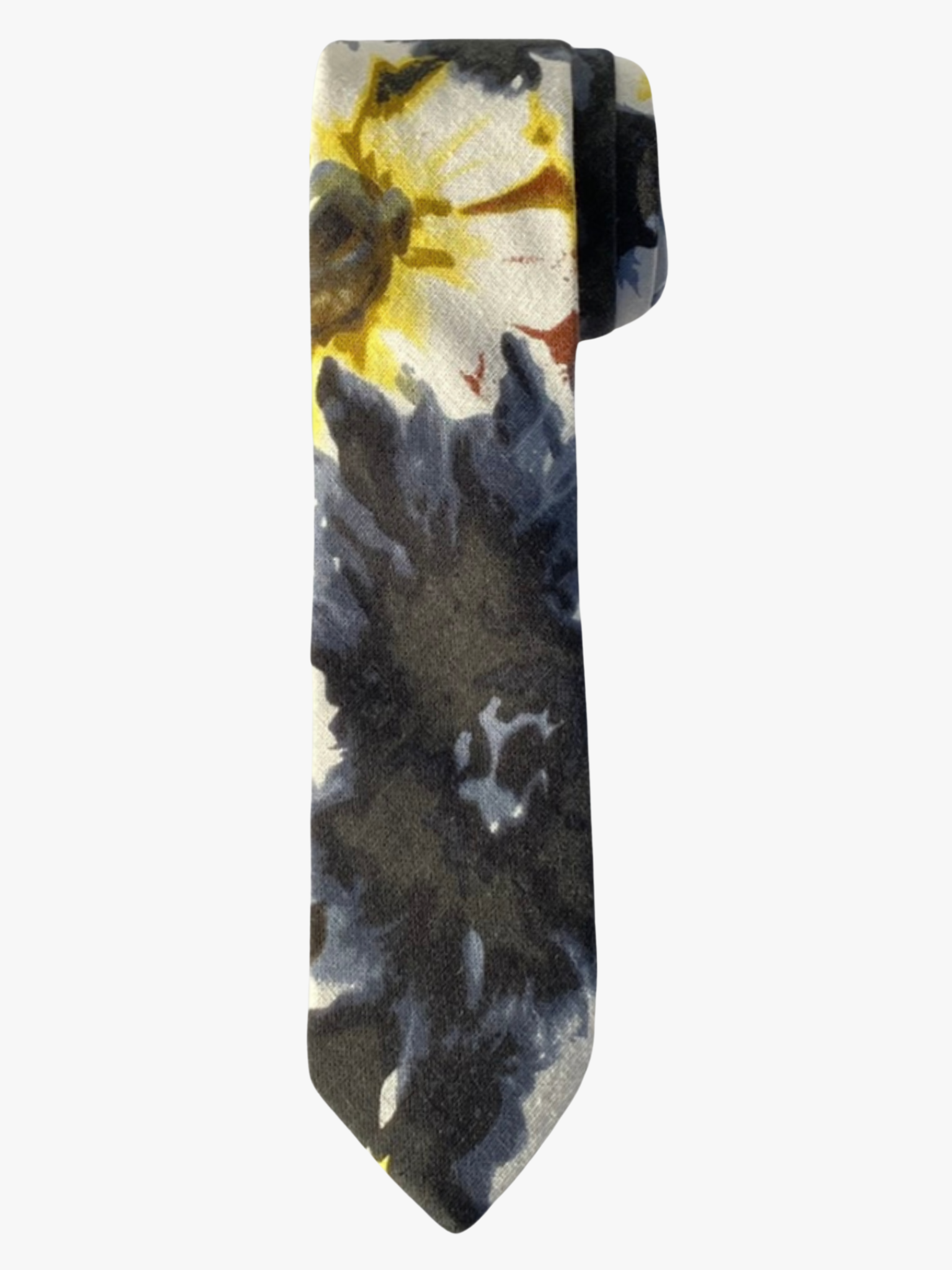 A rolled up unisex yellow, black, and blue floral cotton necktie for teens, missionaries, men, and women.
