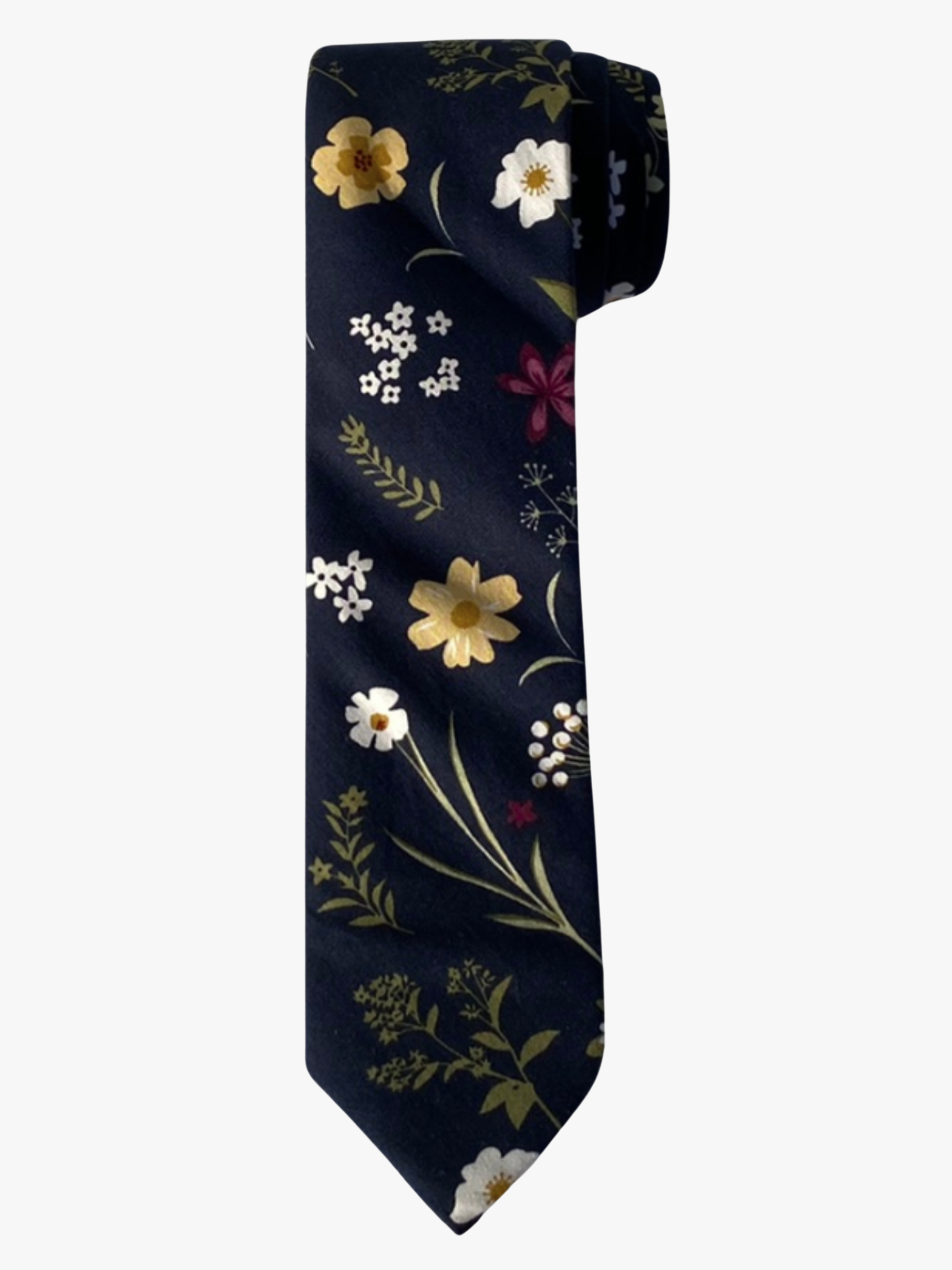 A rolled up navy blue, dark green, white, yellow, and red floral cotton necktie for teens, missionaries, men, and women.
