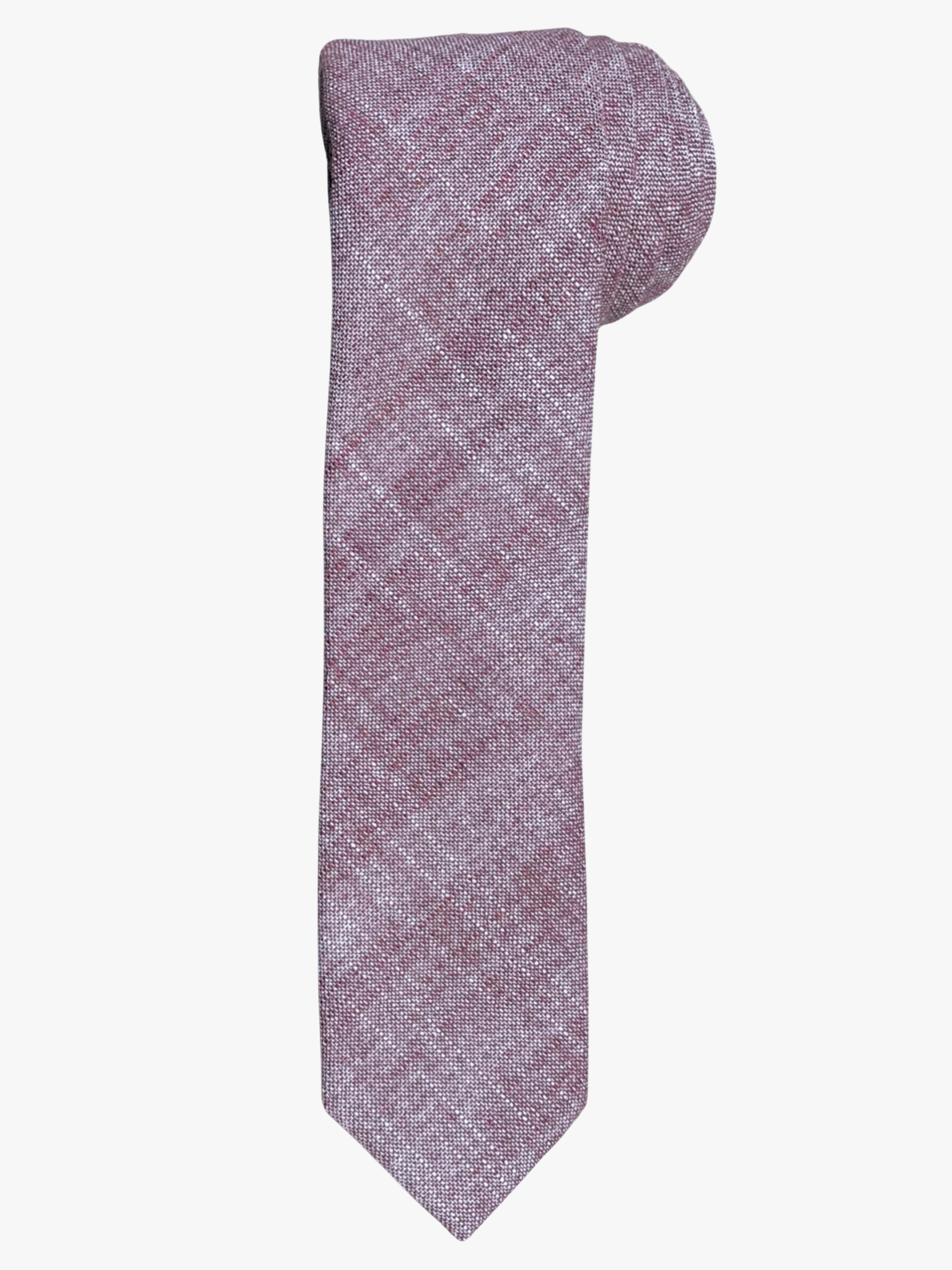 A rolled up unisex light salt pink and dark pink solid speckled cotton necktie for teens, missionaries, men, and women.