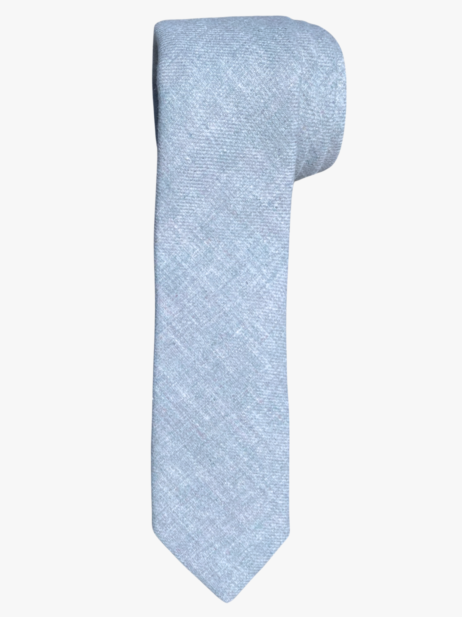 A rolled up unisex light stone gray solid speckled cotton necktie for teens, missionaries, men, and women.
