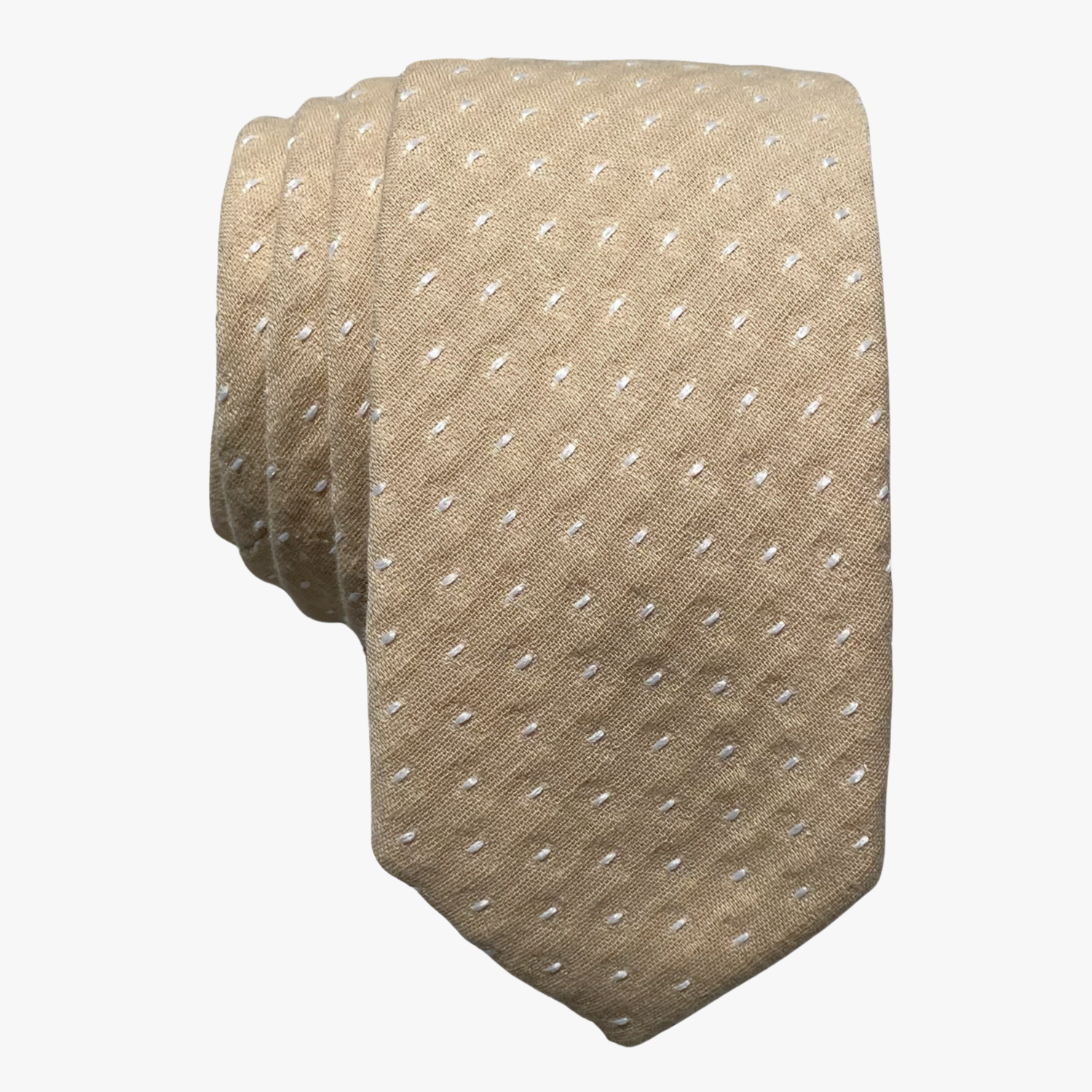 Adult mens cotton polka dot tie with a sandy tan fabric and a repeating pattern of white dots or spots, and a soft feel.