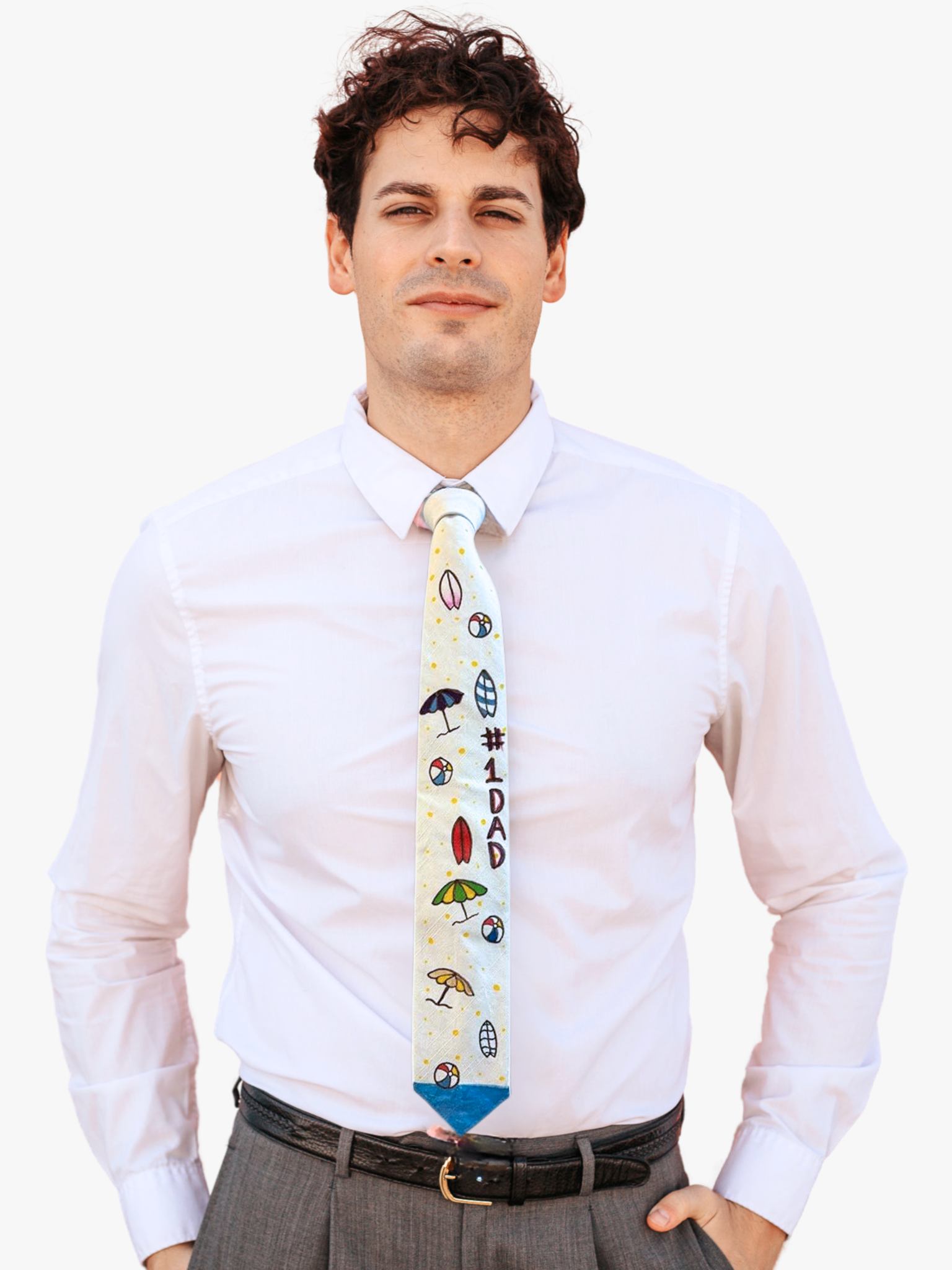 A man wearing a white custom hand drawn necktie featuring colorful surf boards and beach themed drawings by children.