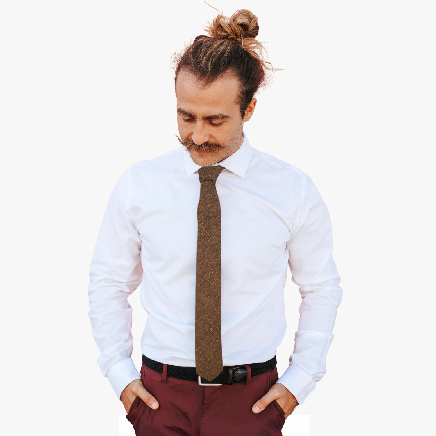 A man wearing a solid speckled tie with copper brown fabric colorful speckles, spots, and dots of colors.