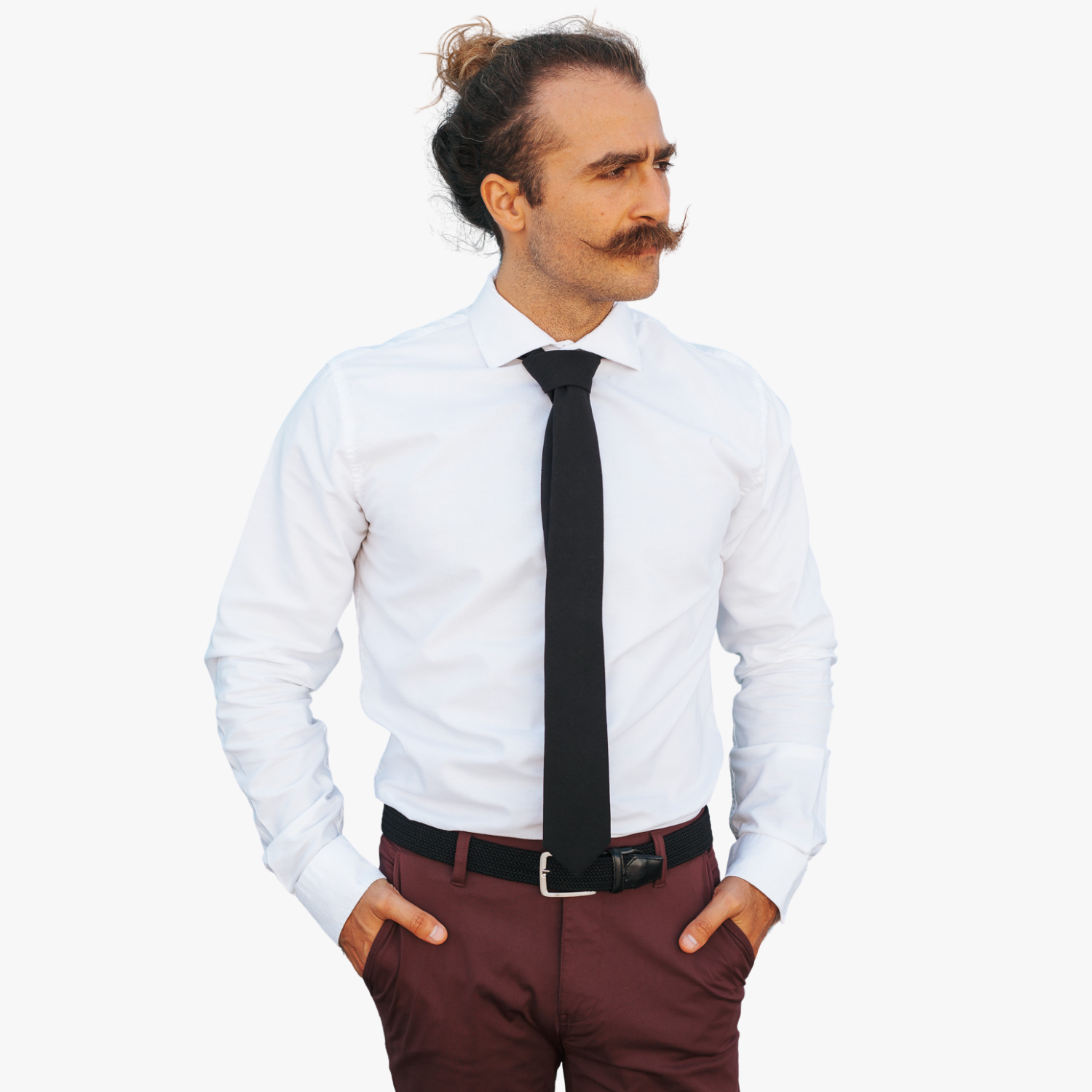 A man with a solid tie with a plain pitch black color.