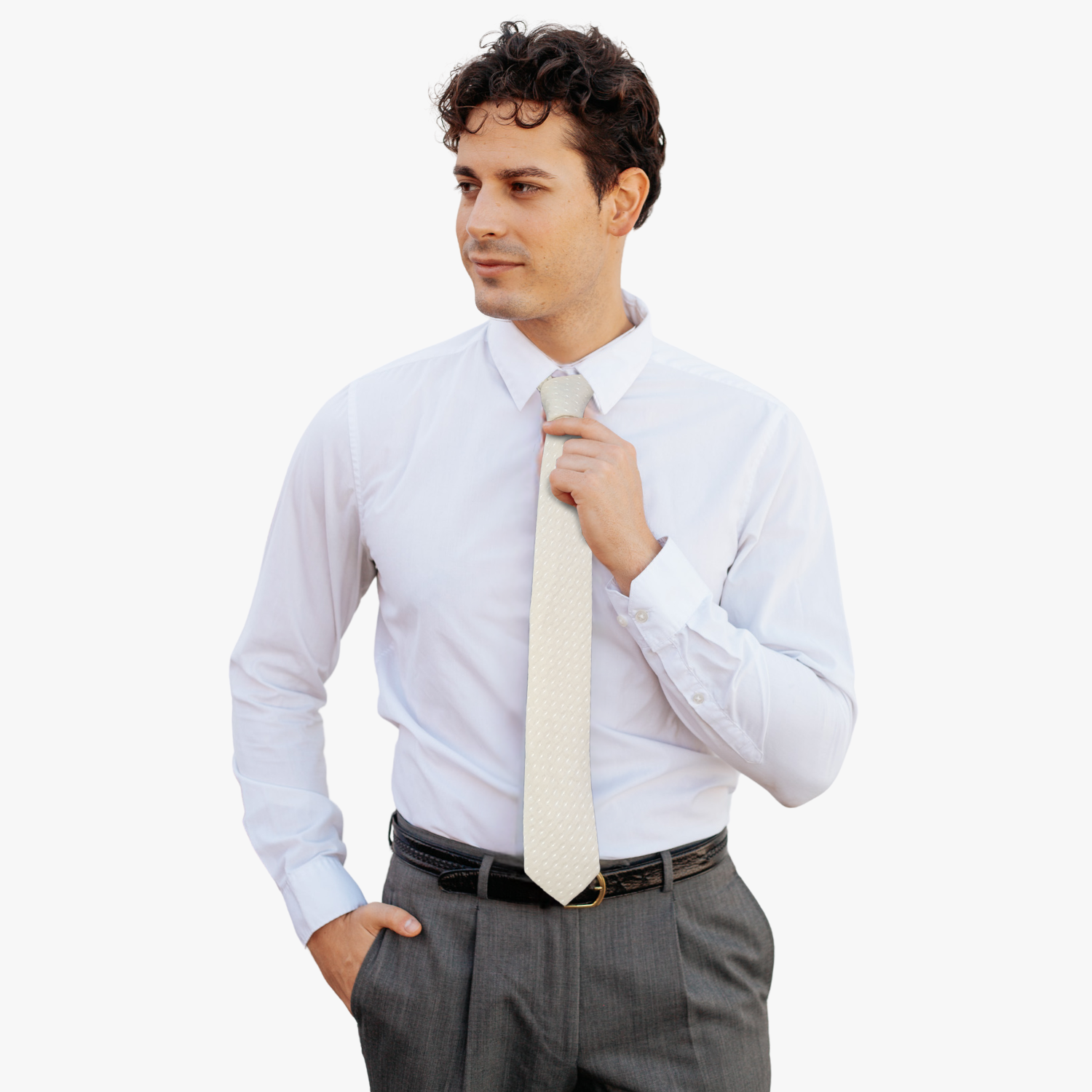 A man wearing a polka dot tie with a light beige tan fabric and a simple repeating pattern of white dots or spots.