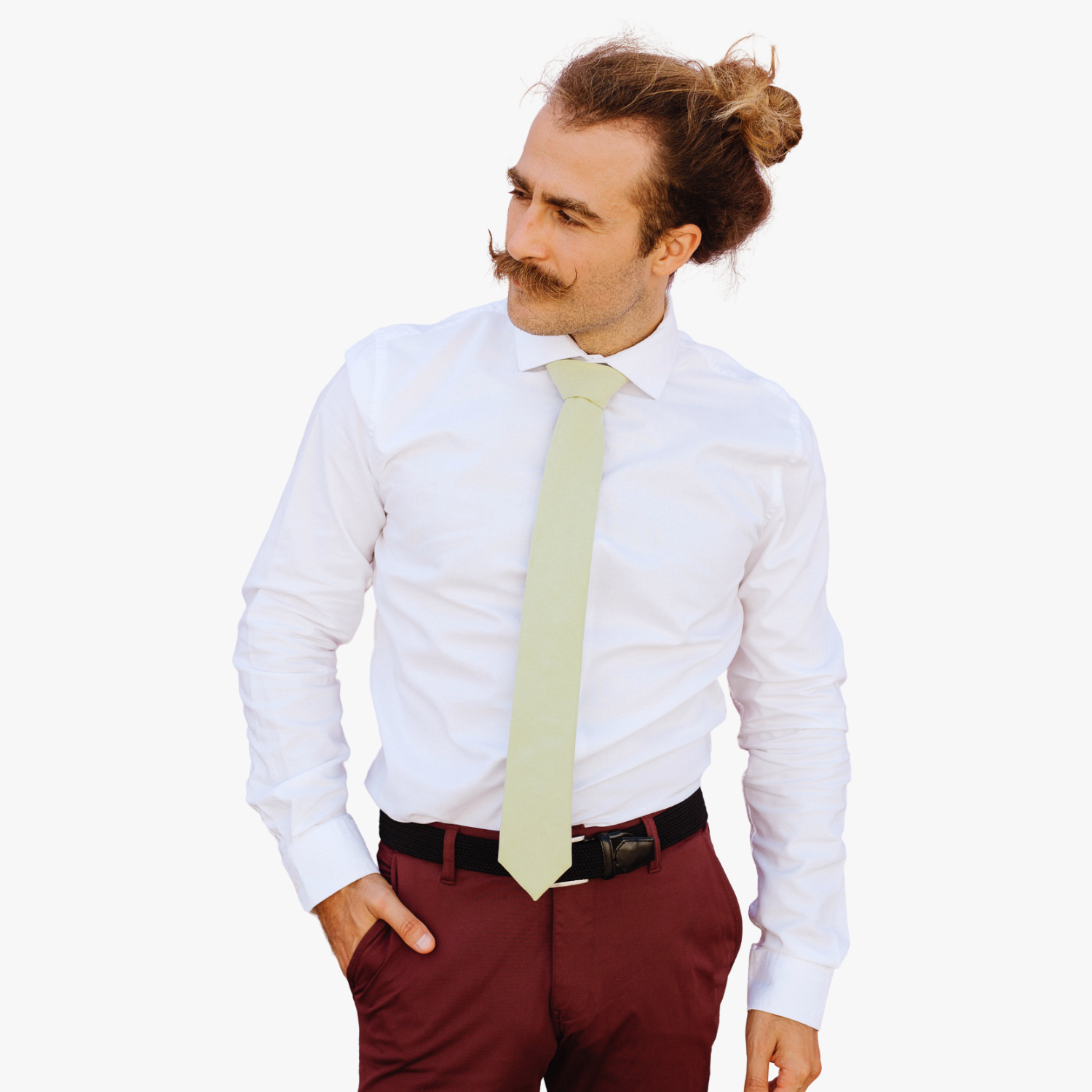 A man with a solid tie with a plain neutral sage green color.