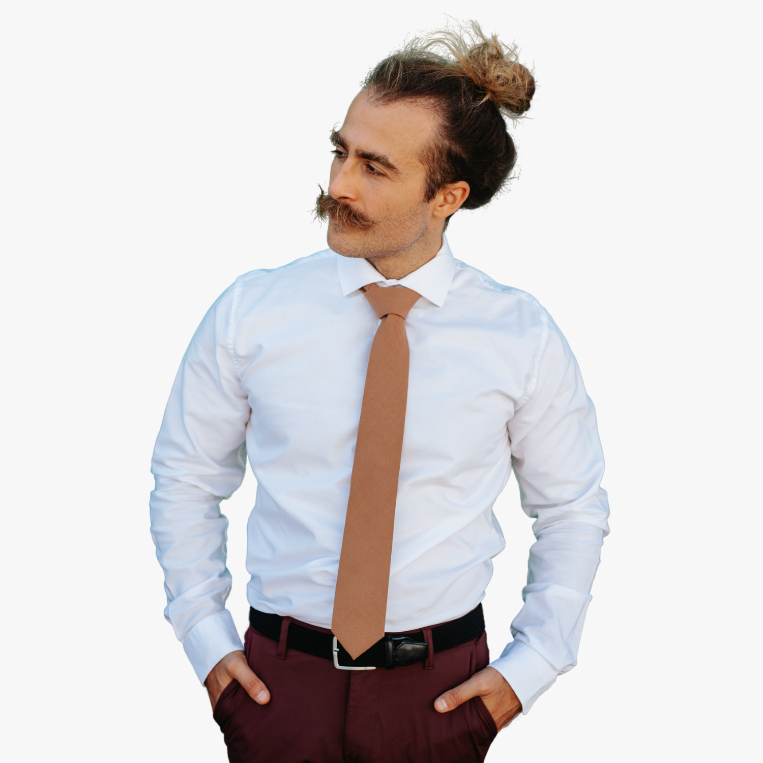 A man with a solid tie with a plain light chocolate taupe brown color.