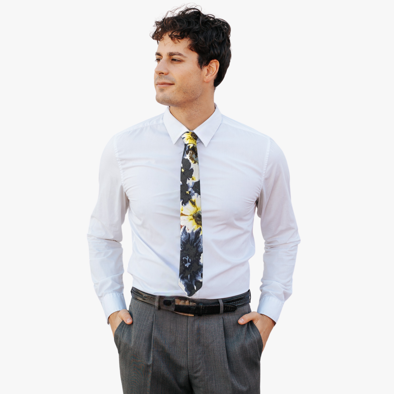 A man wearing a floral tie with abstract designs of large yellow flowers mixed with large spots of black and blue.