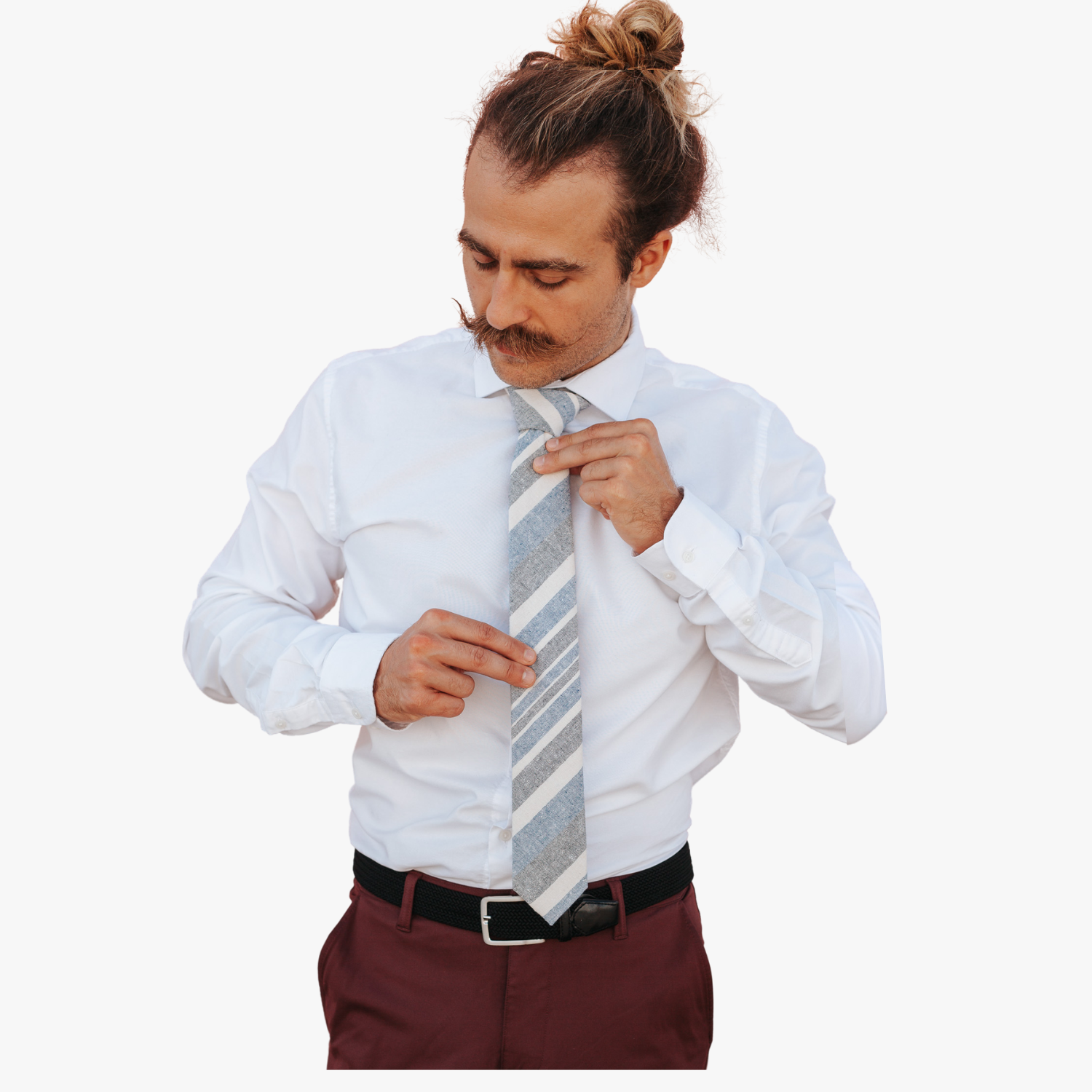 A man wearing a striped tie with denim blue stripe, beige cream lines, gray/grey bars and diagonal designs.