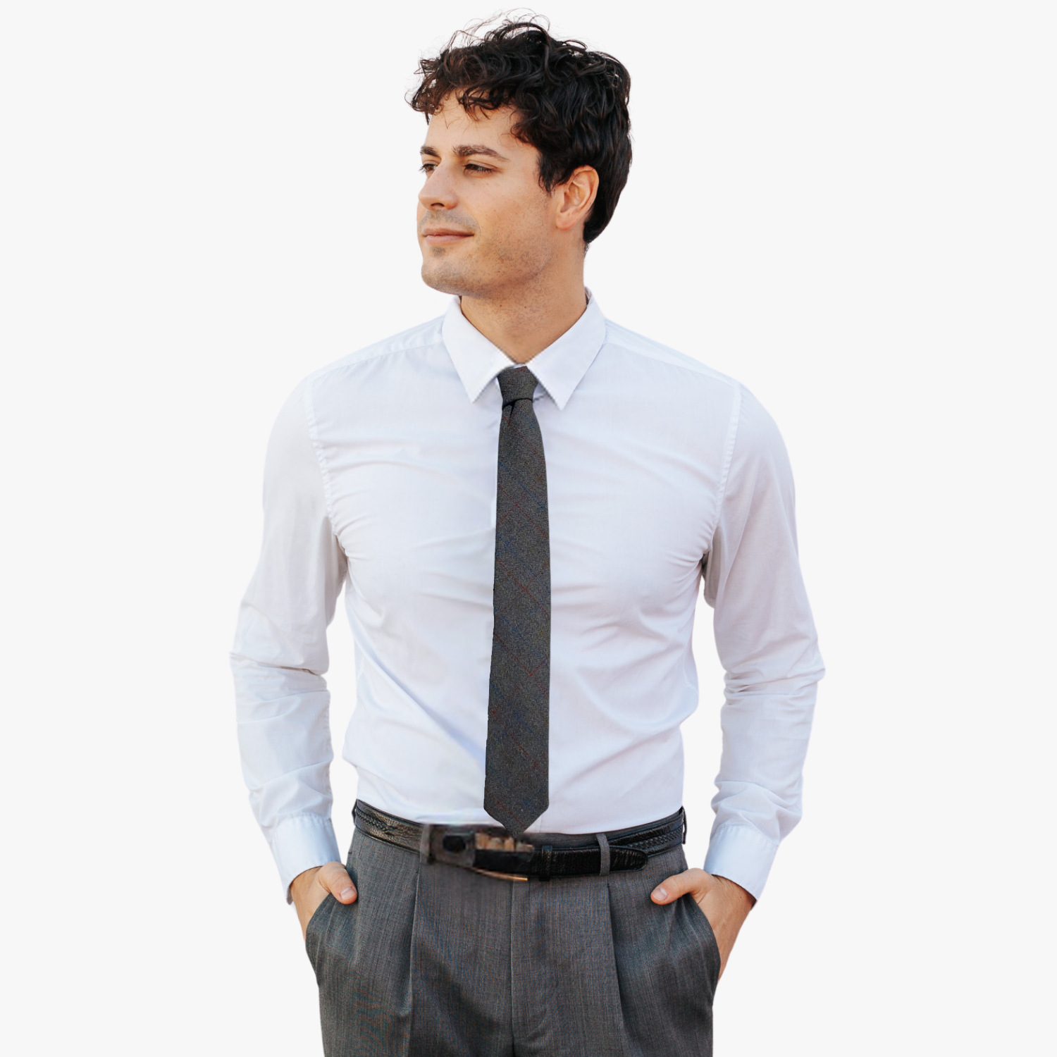 A man wearing a grid tie with dark gray fabric, thin blue and red lines, and subtle grid design.