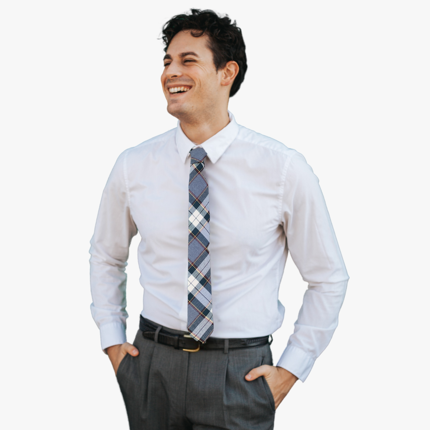 A man wearing a plaid tie with tartan designs of dark gray, red, and yellow on off-white fabric.