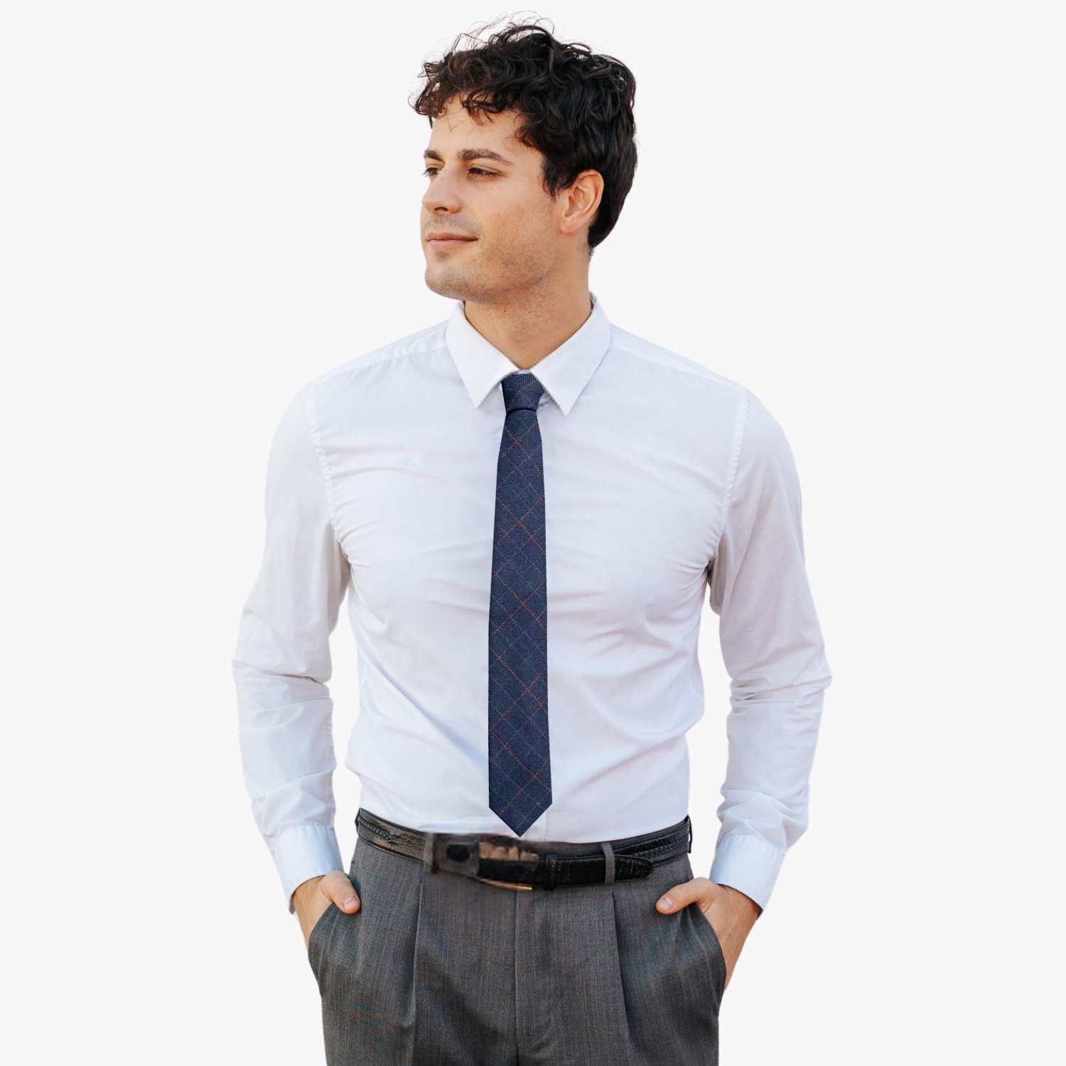 A man wearing a grid tie with navy blue fabric and criss-cross red, green, and purple lines in a grid pattern.