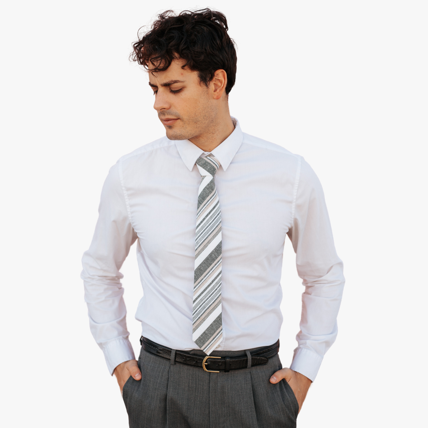 A man wearing church clothes and a striped tie with dark gray stripe, white lines, gold bars and diagonal designs.