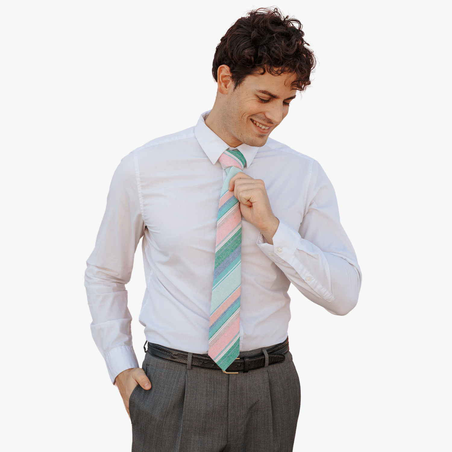 A man wearing church clothes and a striped tie with light pink stripe, baby blue lines, dark green bars and diagonal designs.