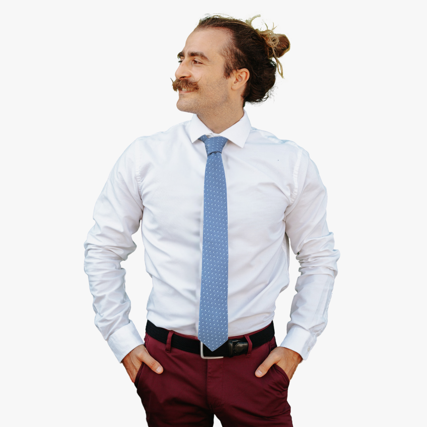 A man wearing a polka dot tie with a slate blue gray fabric and a simple repeating pattern of white dots or spots