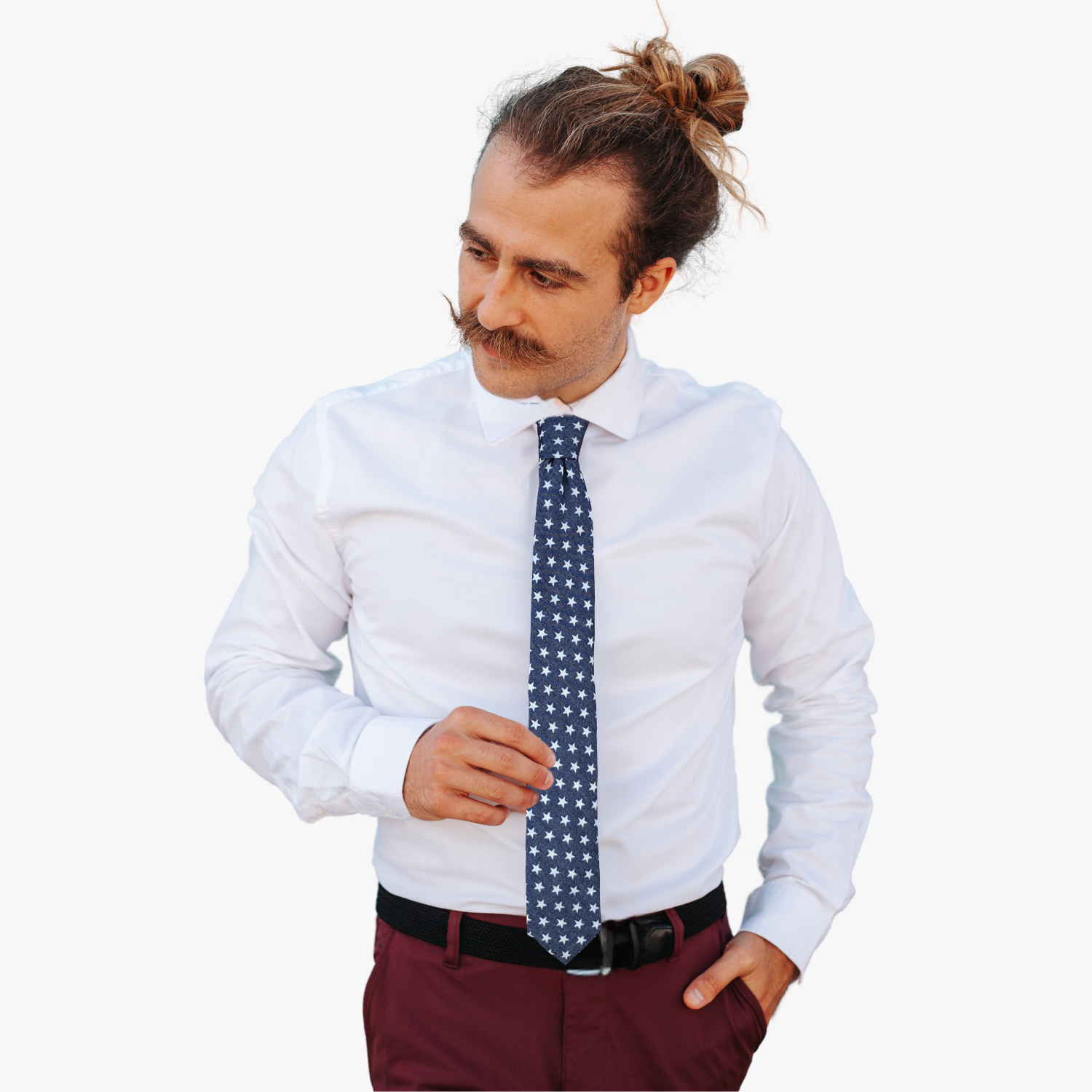 A man wearing a USA stars tie with white patriotic American flag stars on a solid navy blue fabric.