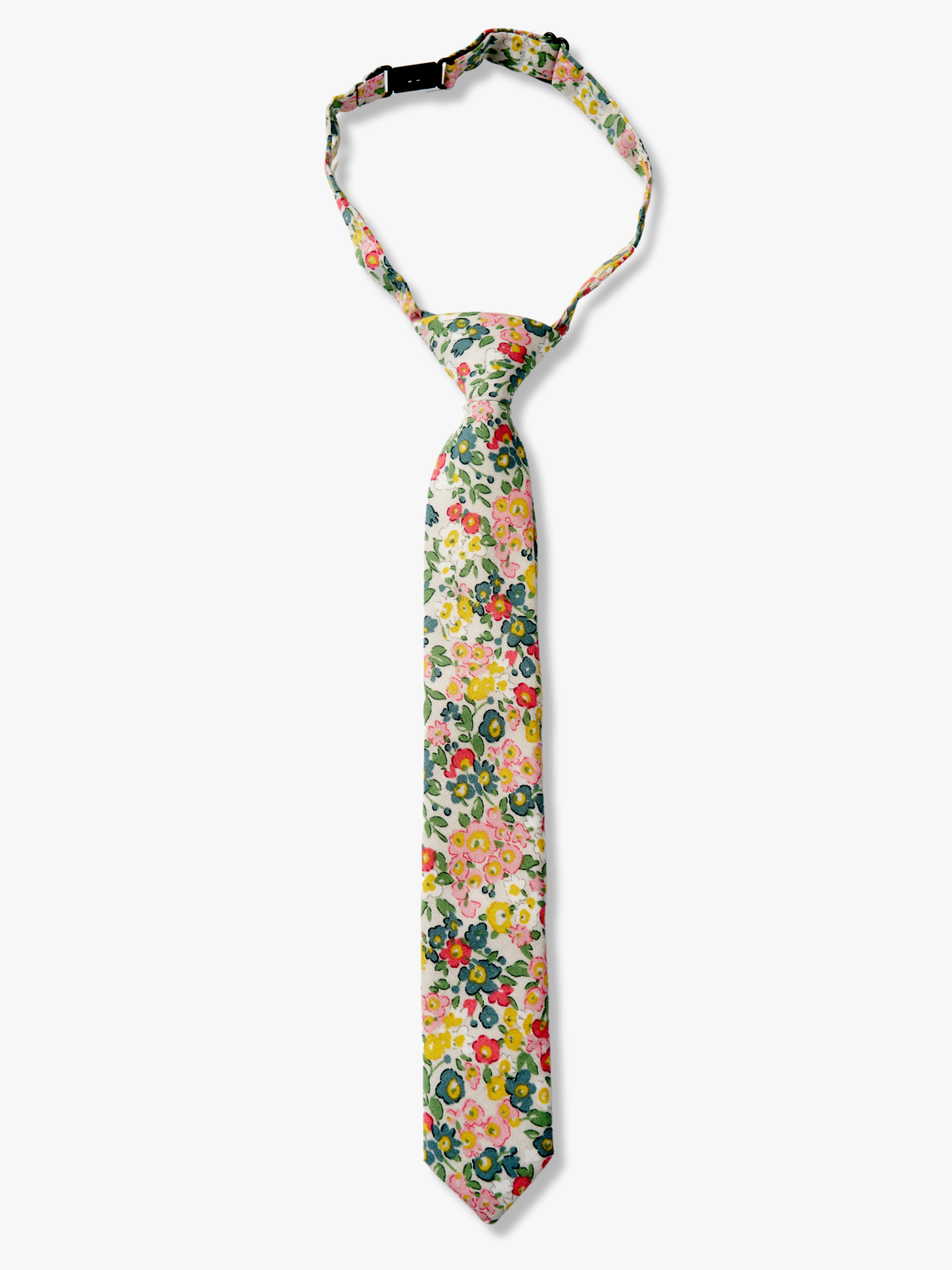 Fall Kids floral pretied tie with small pink flowers, teal petals, yellow blossoms and green leaves on offwhite cotton fabric