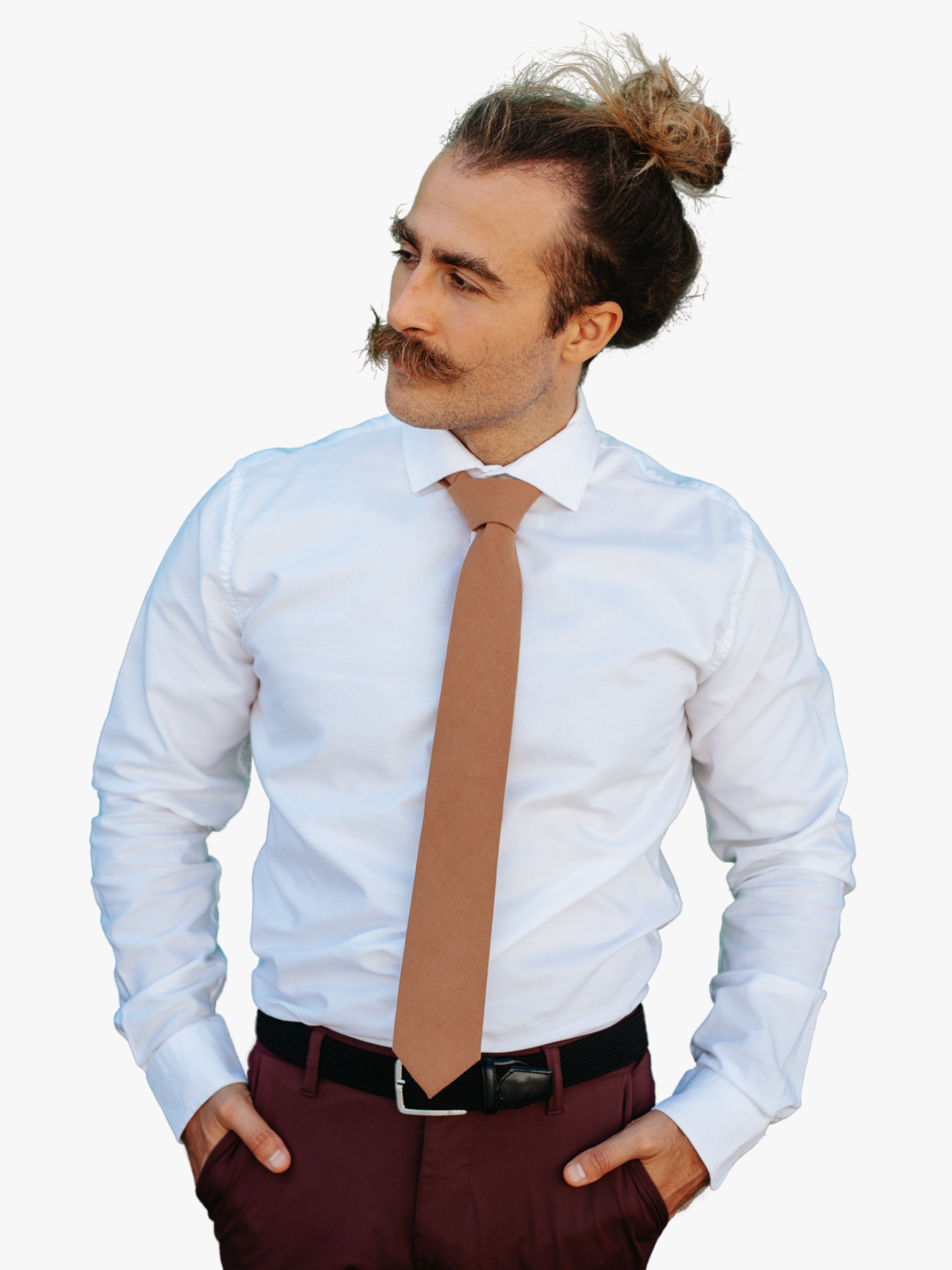 A man with a solid tie with a plain light chocolate taupe brown color.