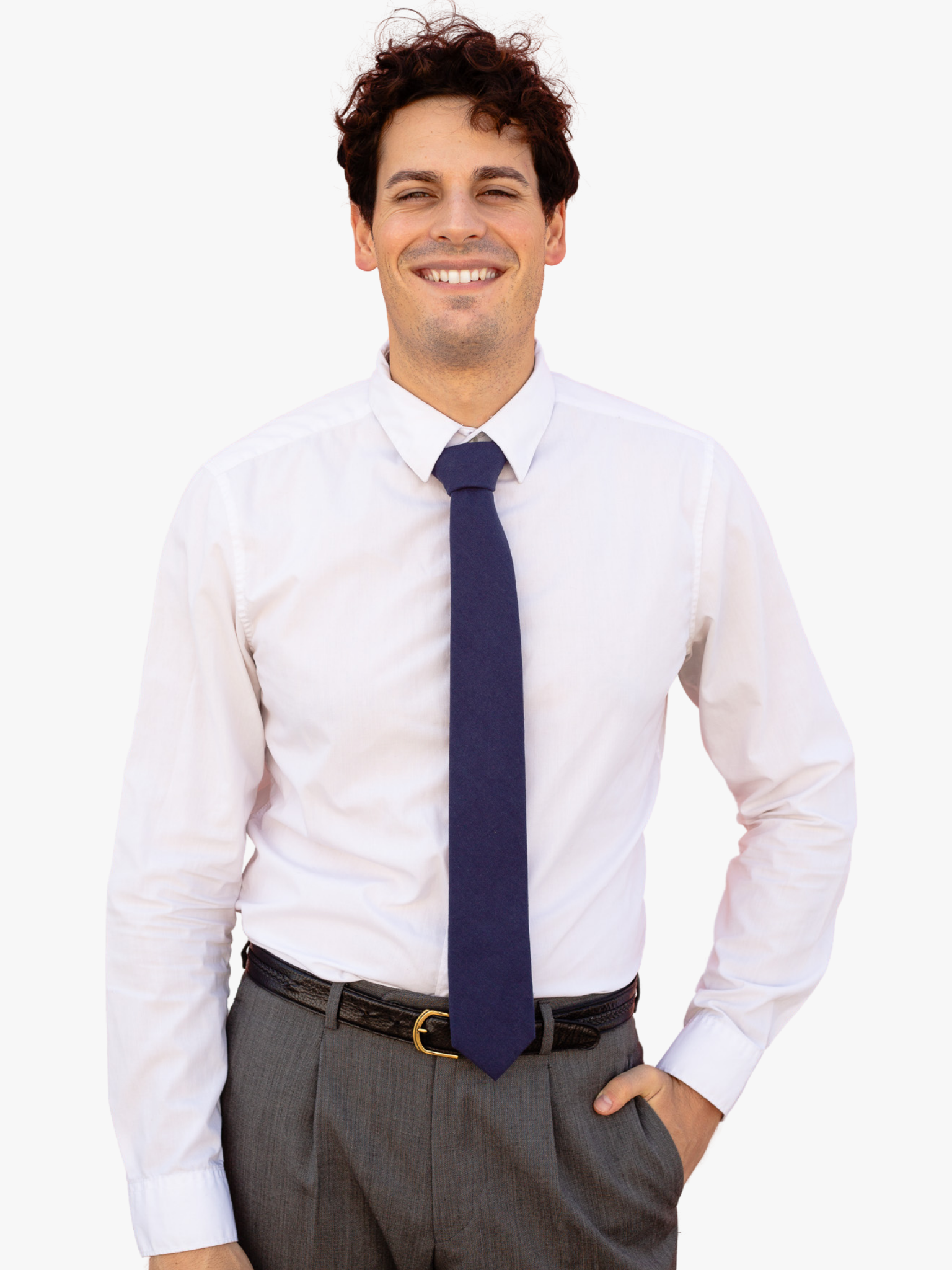 A man with a solid tie with a plain navy blue color.