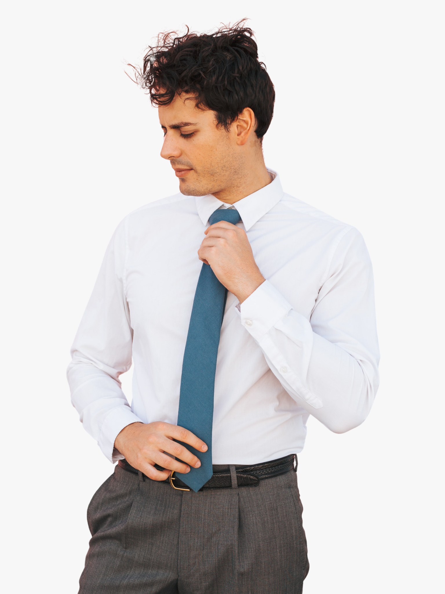 A man with a solid tie with a plain deep cobalt blue color.