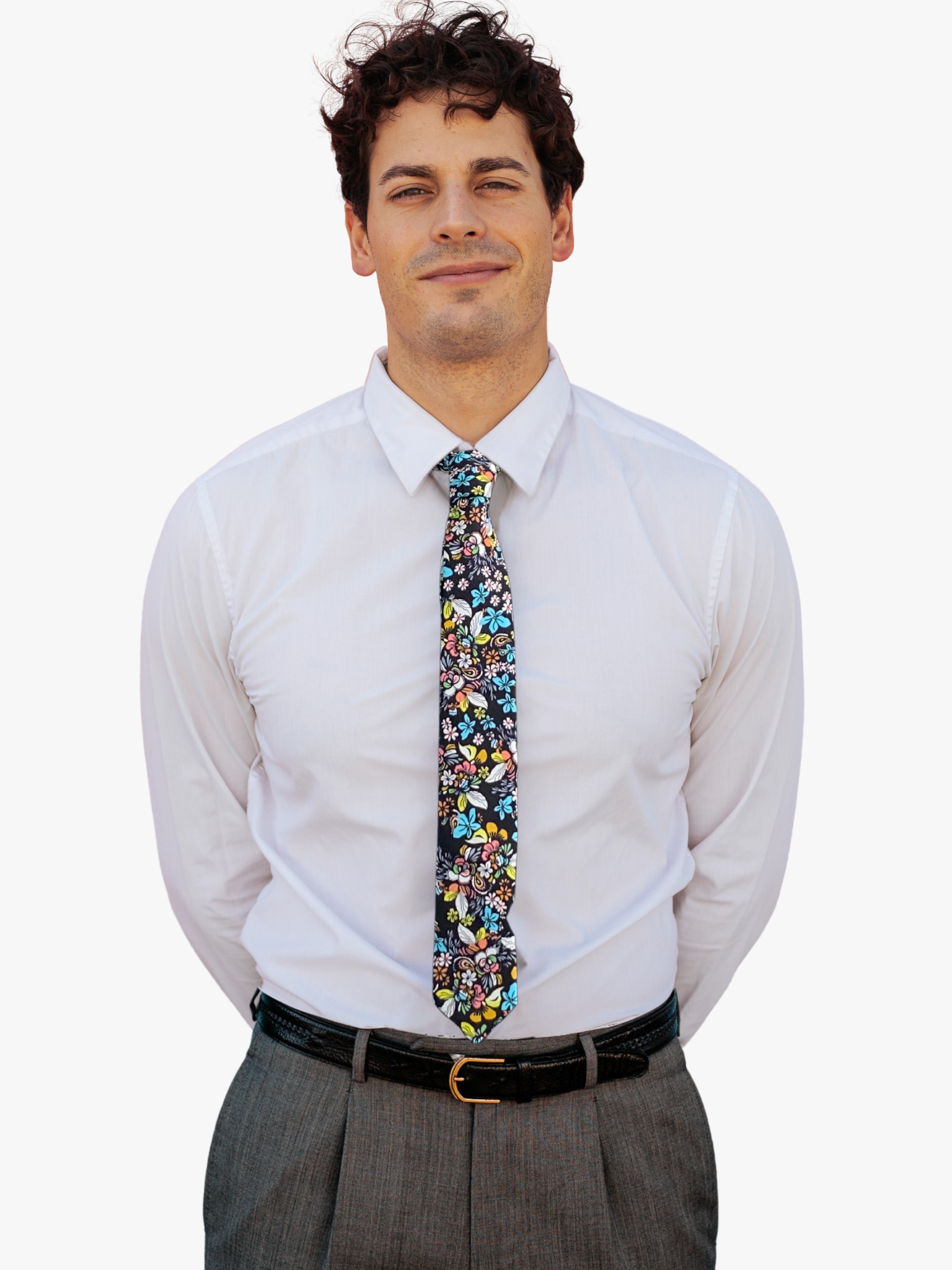 A man wearing a floral tie with black fabric, colorful blue and yellow flowers and green, orange, and pink nature designs.