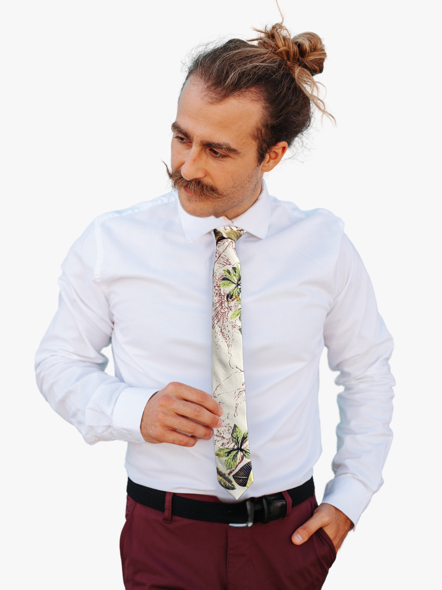 A man wearing a floral tie with retro woven beige fabric, yellow and green leaves accented with artistic brown patterns.