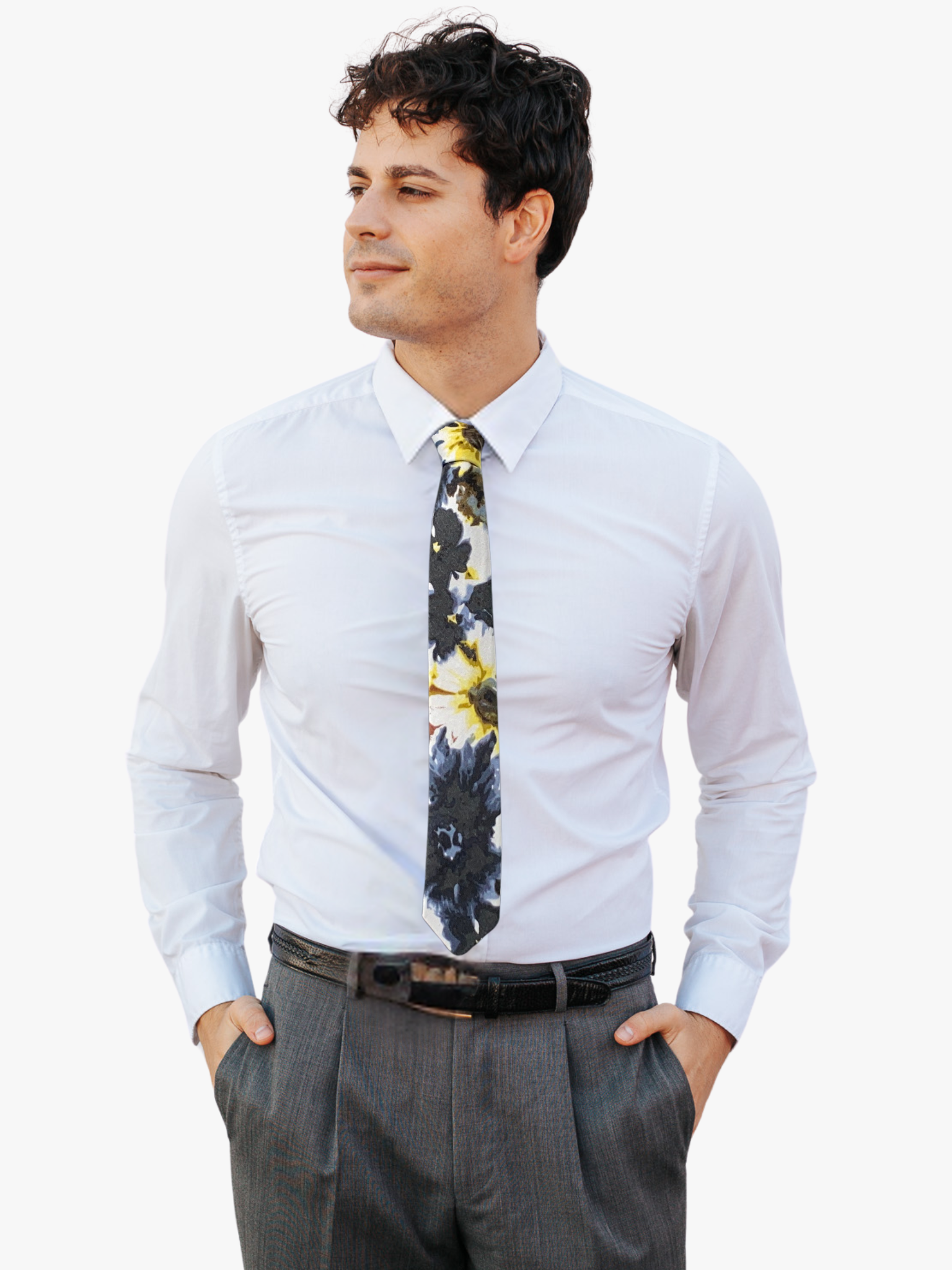 A man wearing a floral tie with abstract designs of large yellow flowers mixed with large spots of black and blue.