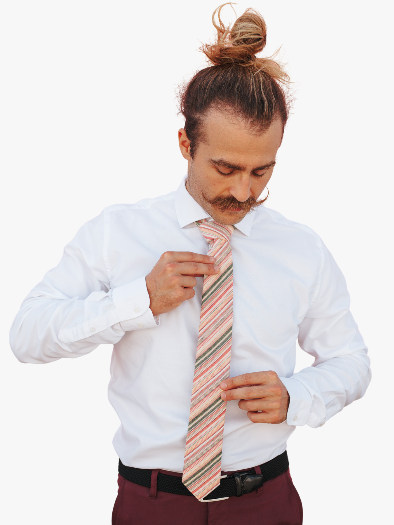 A man wearing church clothes and a striped tie with hot pink stripe, tan yellow lines, dark bars and diagonal designs.