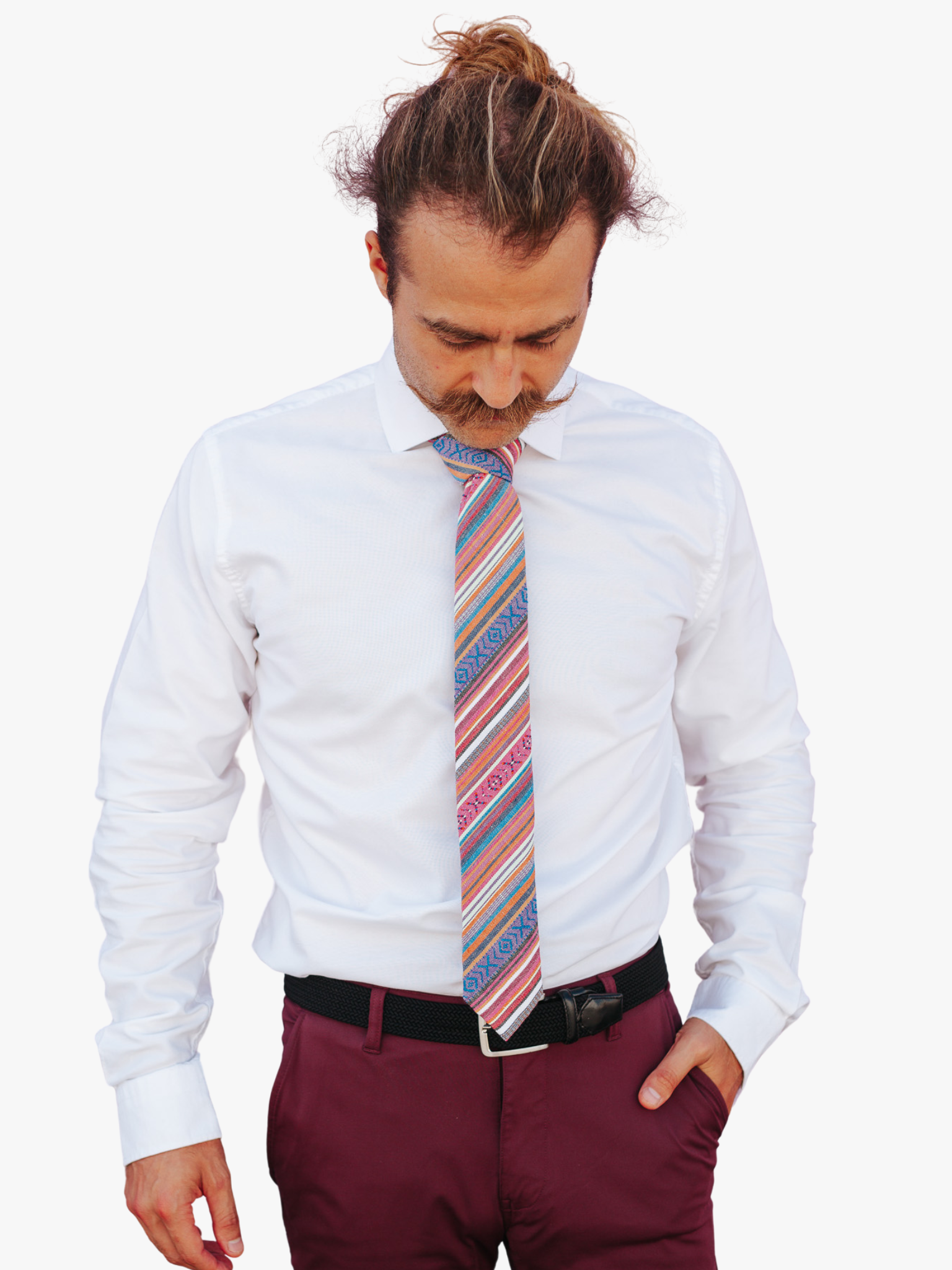 A man wearing church clothes and a striped tie with blue stripe, orange lines, red bars and cross designs.