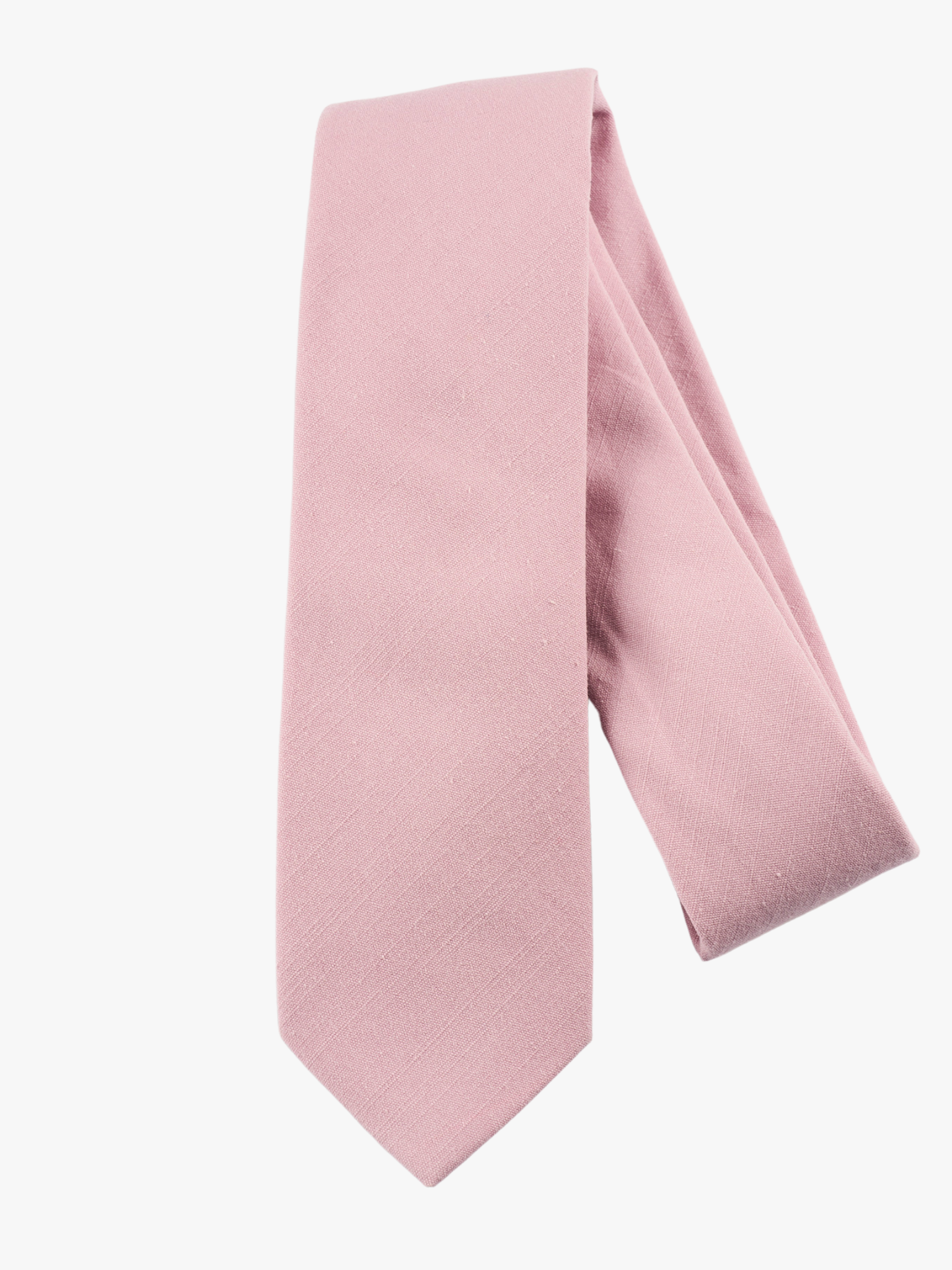 A folded solid woven cotton men's necktie with a simple light rose dusty pink color.