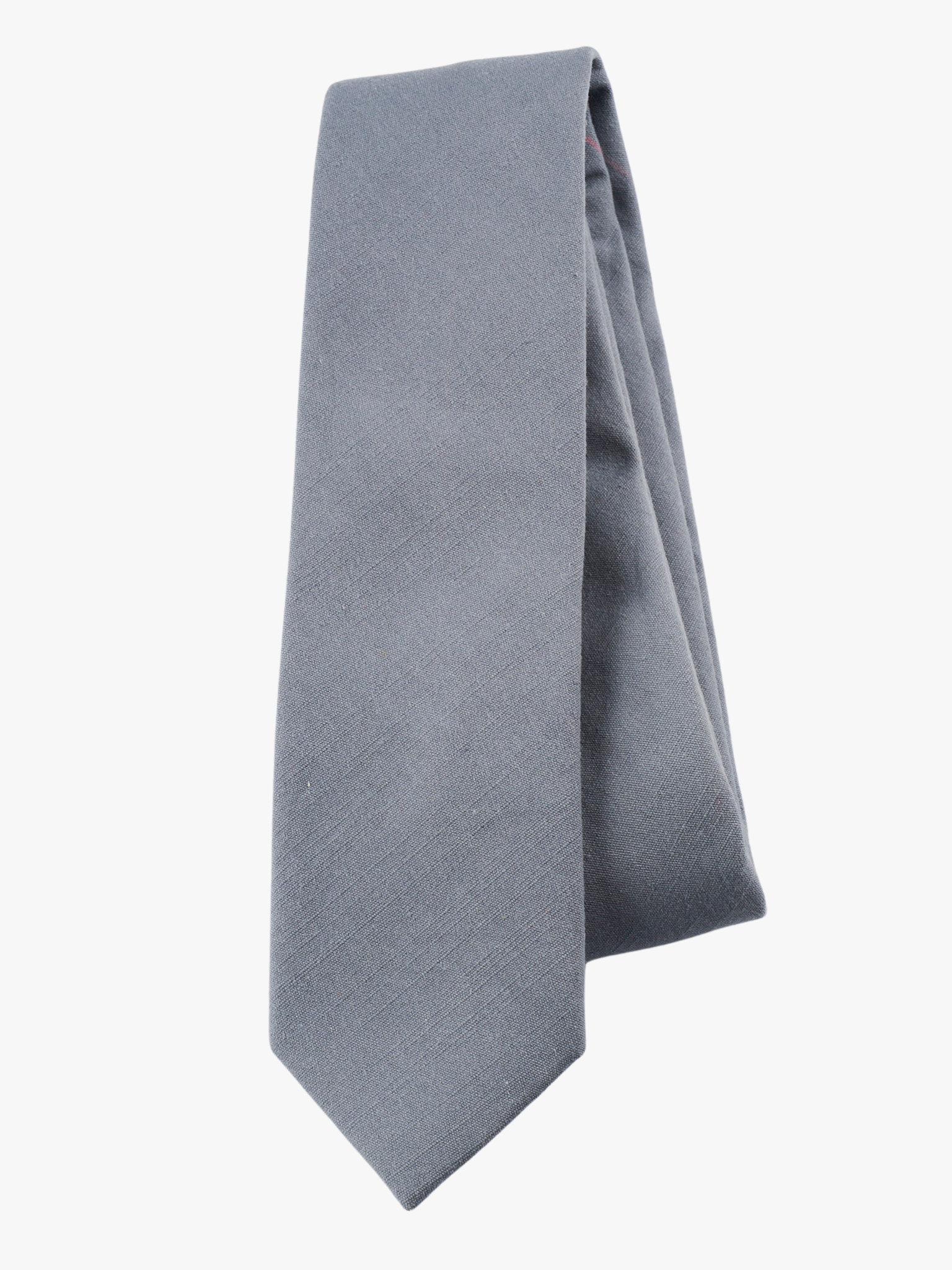 A folded solid woven cotton men's necktie with a simple neutral light gray-blue color.