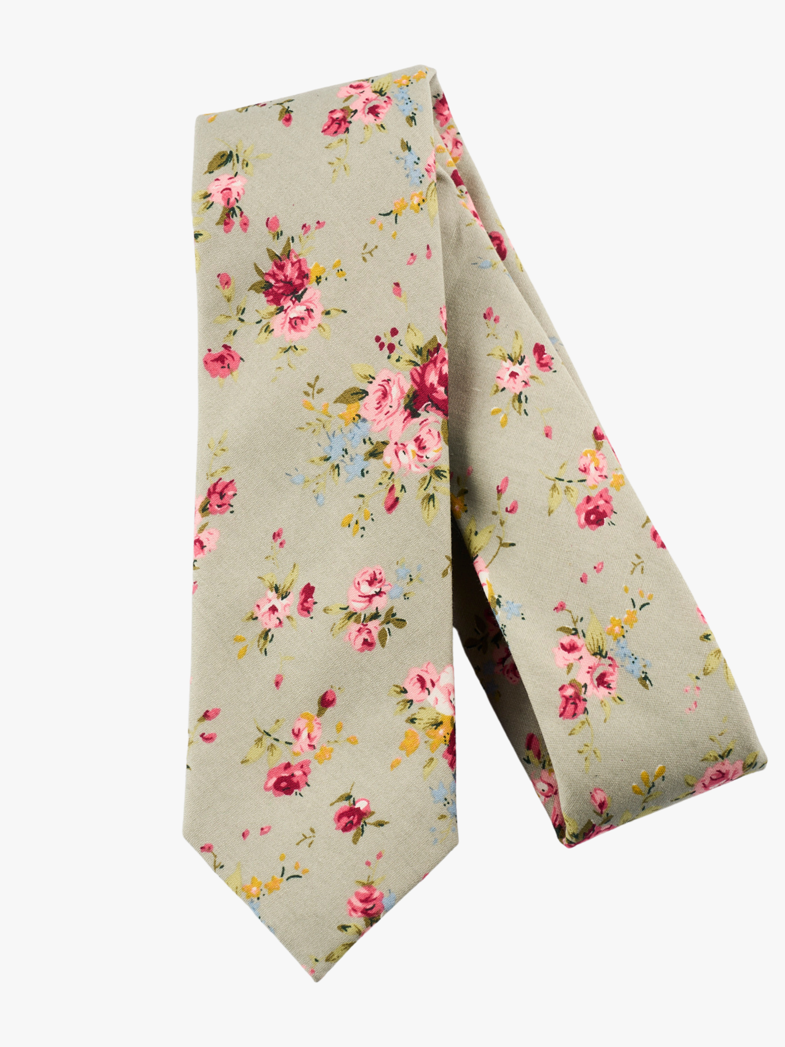 A folded pure cotton, floral adult men's necktie with red roses flowers, yellow and pink blossoms and green leaves.