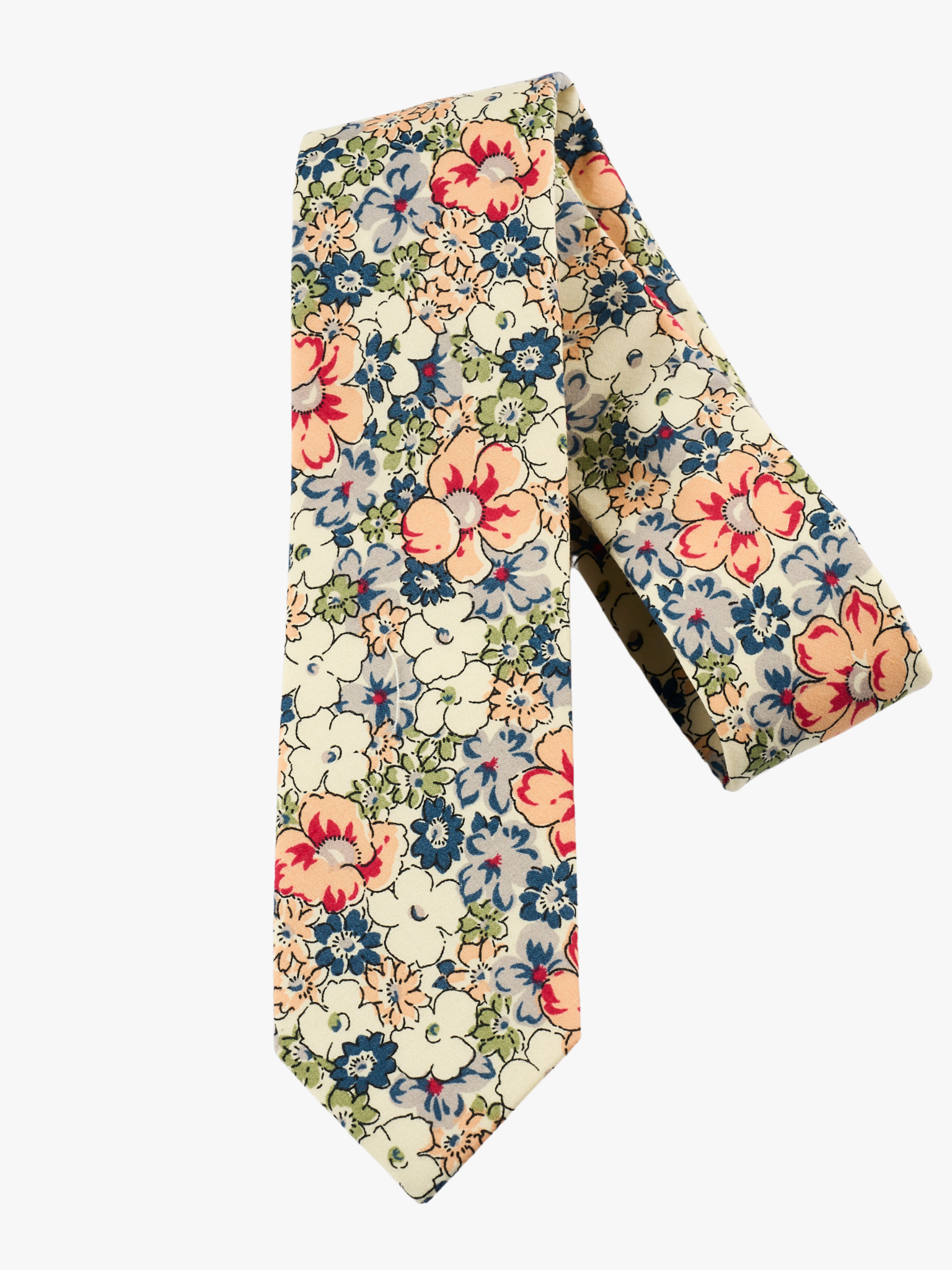 A folded woven cotton, floral men's tie with blue flowers, white petals, and peach or salmon blossoms and green leaves.