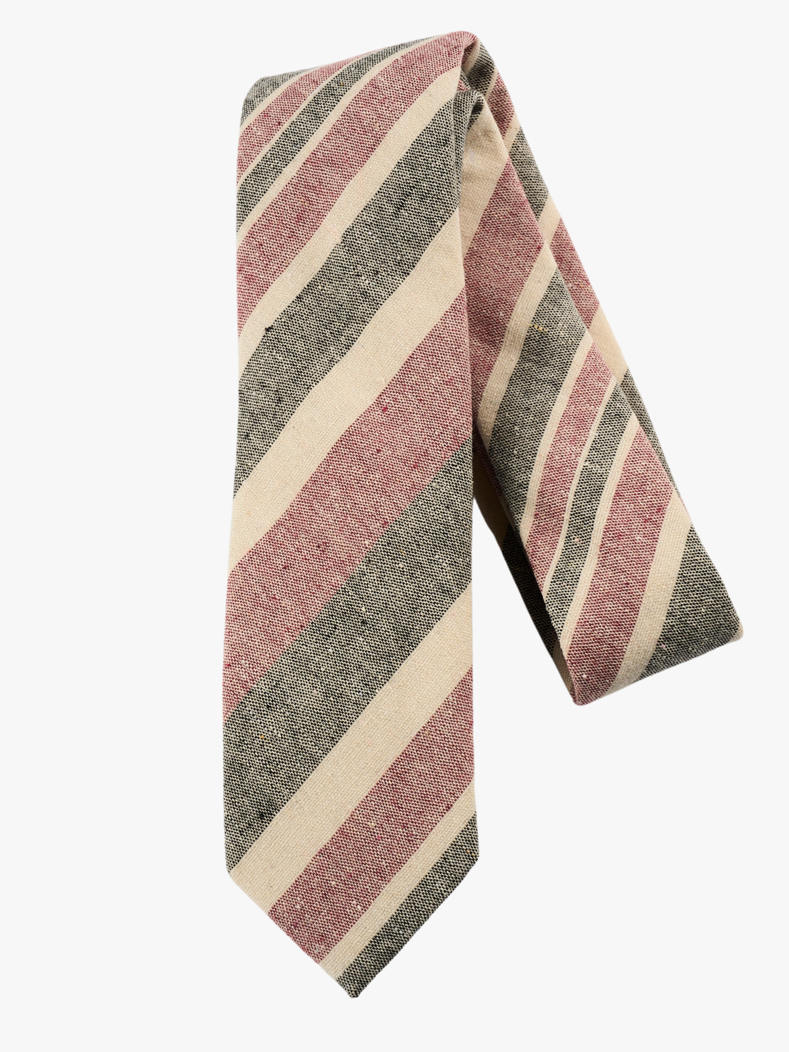 A folded woven cotton, striped men's tie with crimson red stripes, dark gray lines, beige cream bars and diagonal designs.