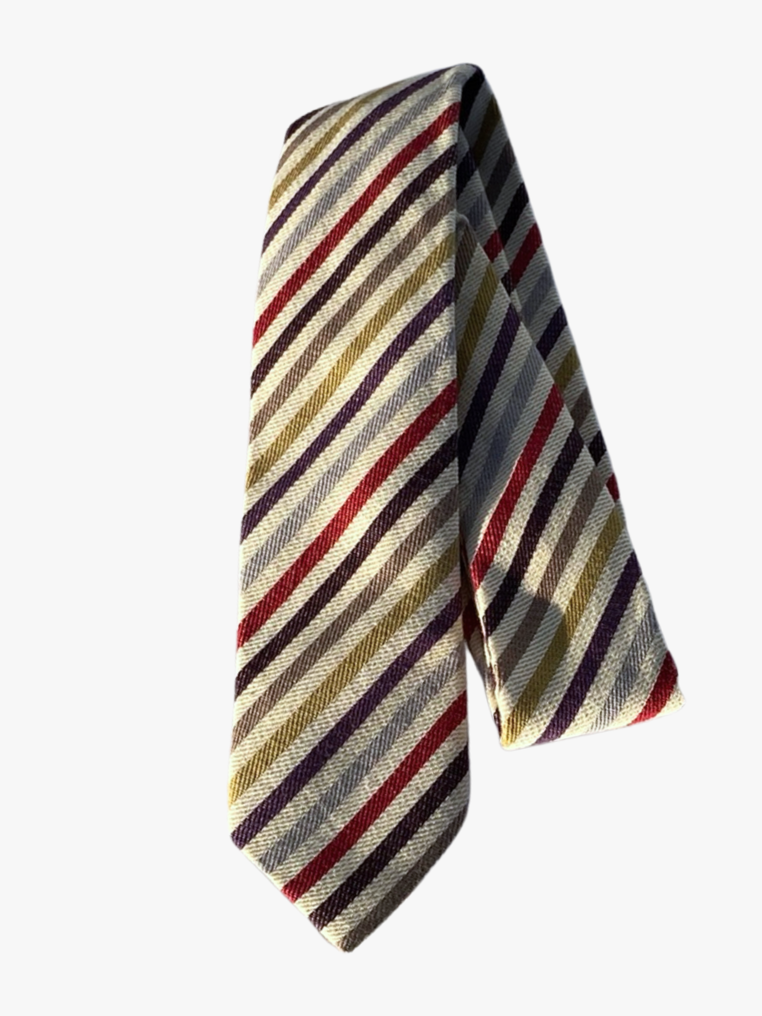 A folded striped adult men's necktie with beige fabric and thin lines of ochre yellow, deep purple, crimson red, and tan.