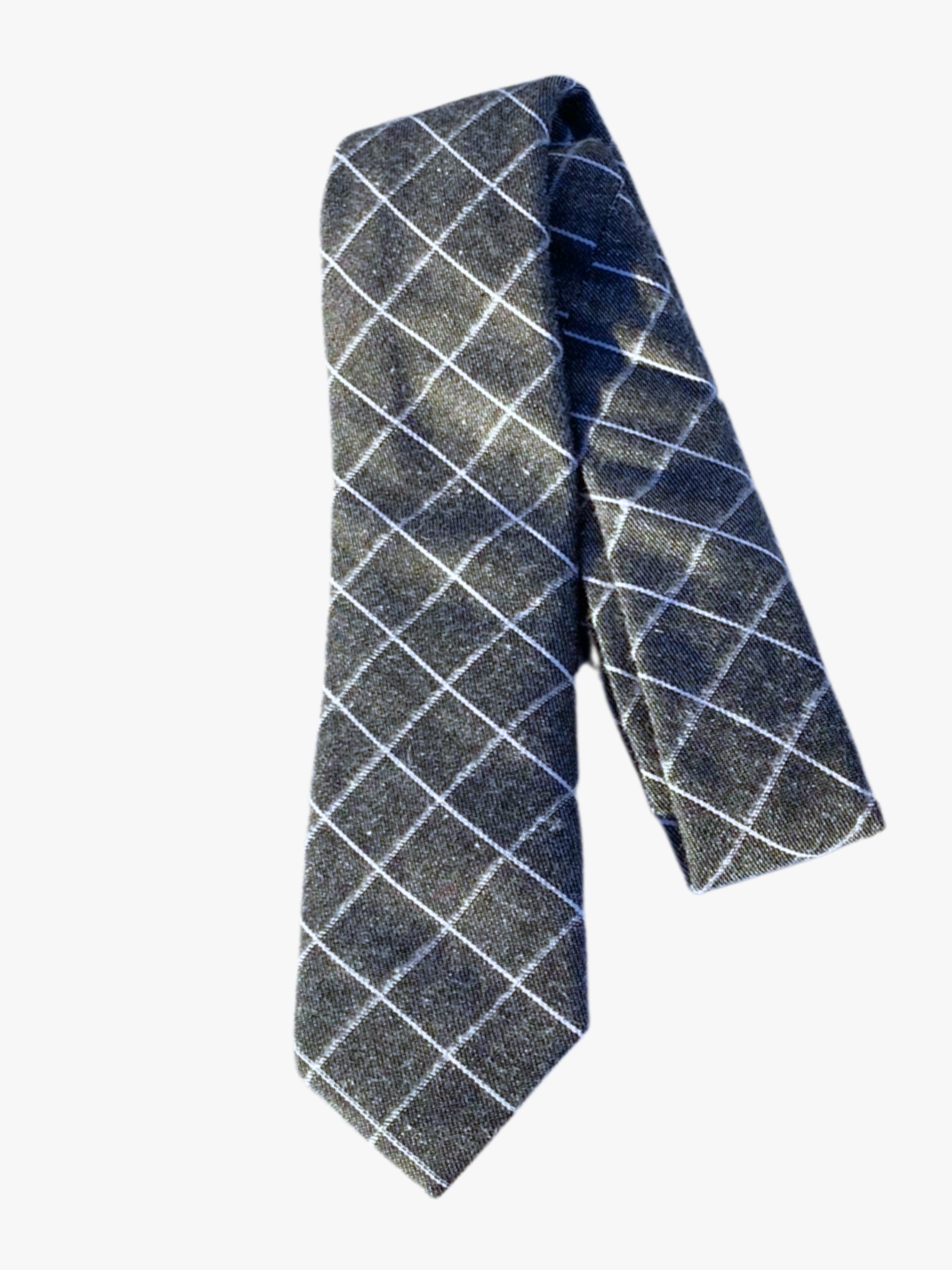 A folded plaid adult men's necktie with a simple gray fabric and intersecting white lines in a grid pattern.