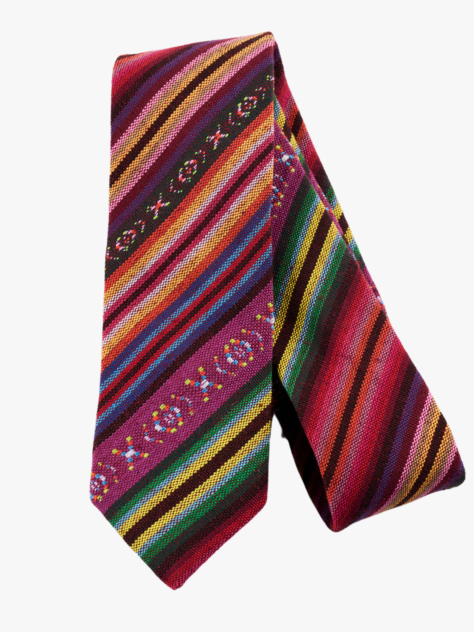 A folded Latin American-inspired striped tie for adult menpurple stripes, green and yellow lines, red bars and cross designs.