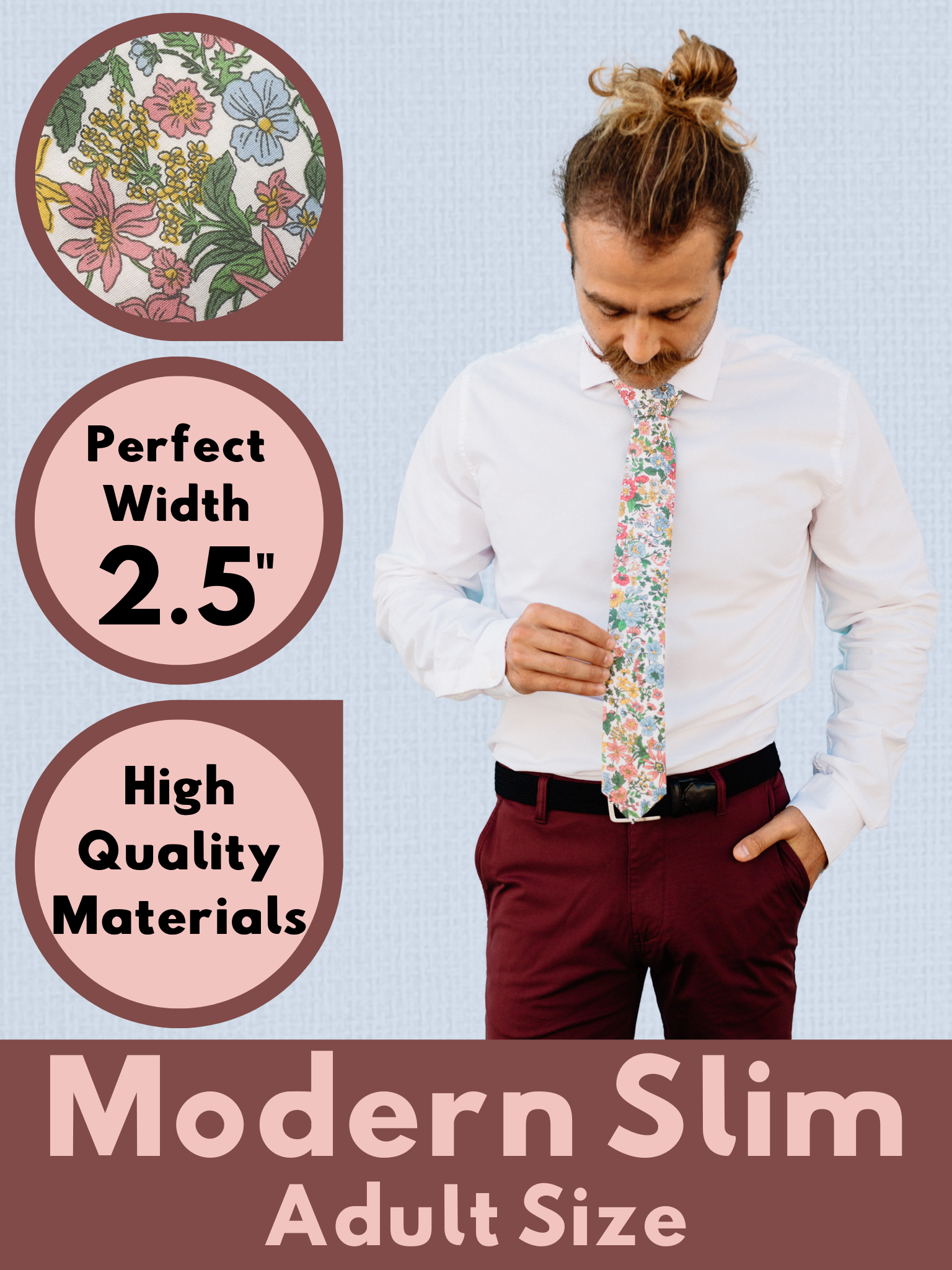 A graphic showing a man in a blue, pink, and green floral modern slim tie that is 2.5 inches wide and made of cotton.