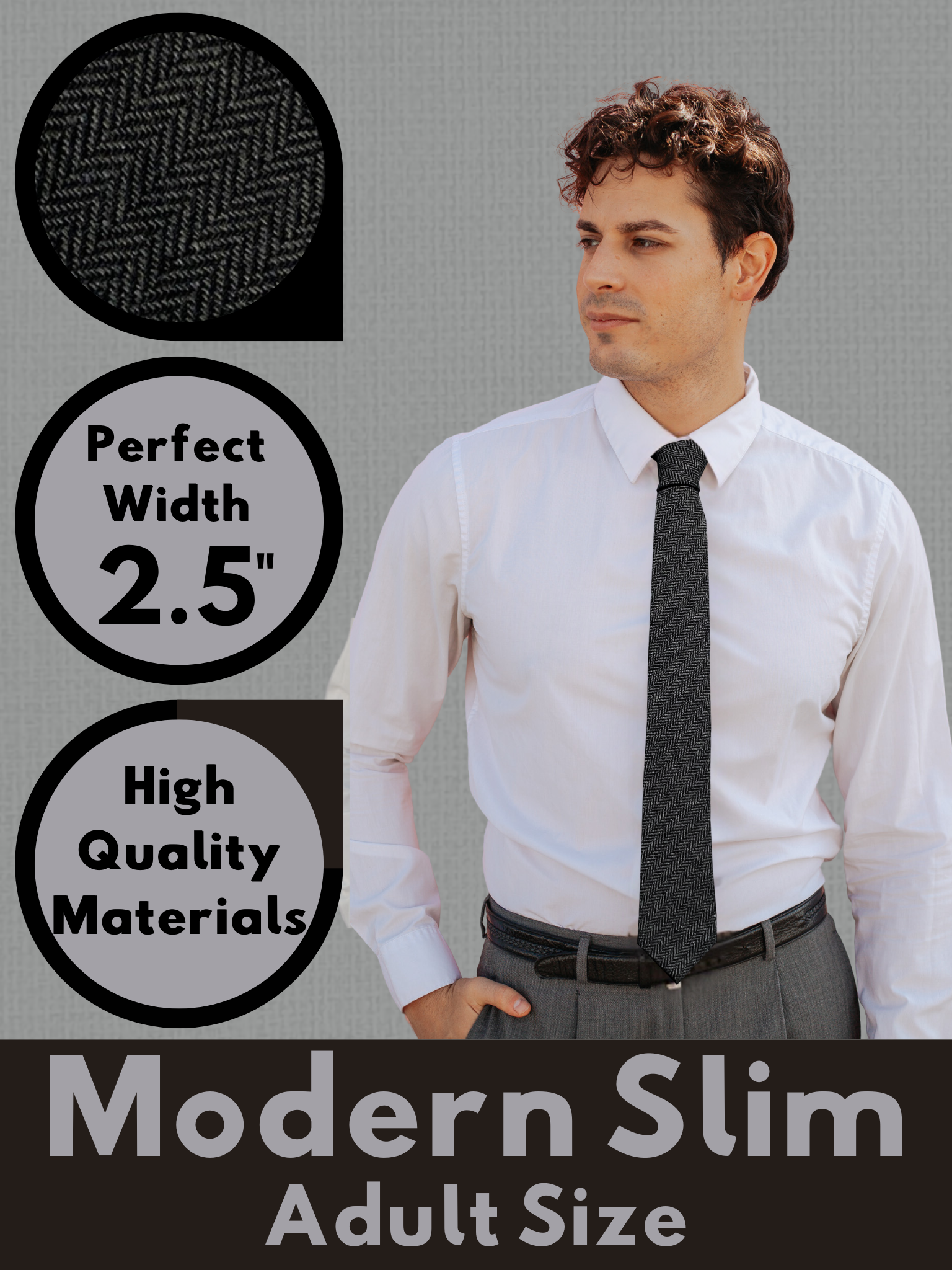 A graphic showing a man in a dark gray and black herringbone modern slim necktie that is 2.5 inches wide and made of cotton.