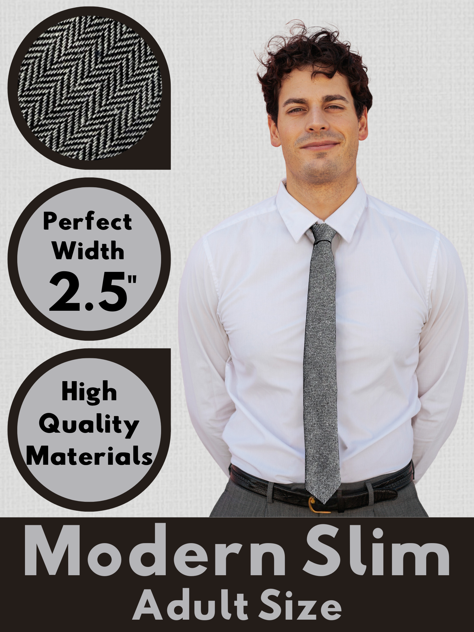 A graphic showing a man in a black and white herringbone modern slim necktie that is 2.5 inches wide and made of cotton.