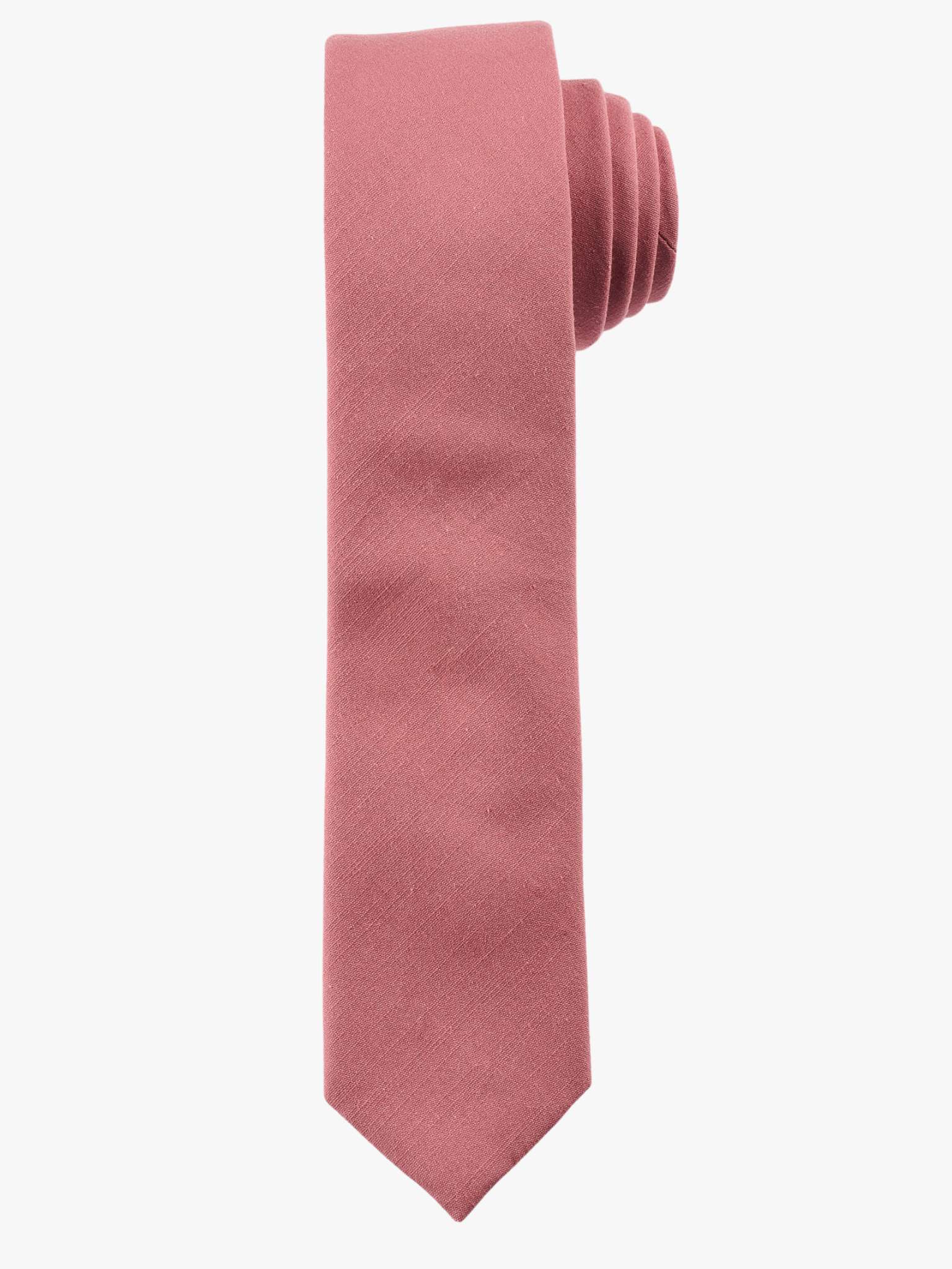 A rolled up rose-gold dusty pink solid-colored cotton necktie for teens, missionaries, men, and women.