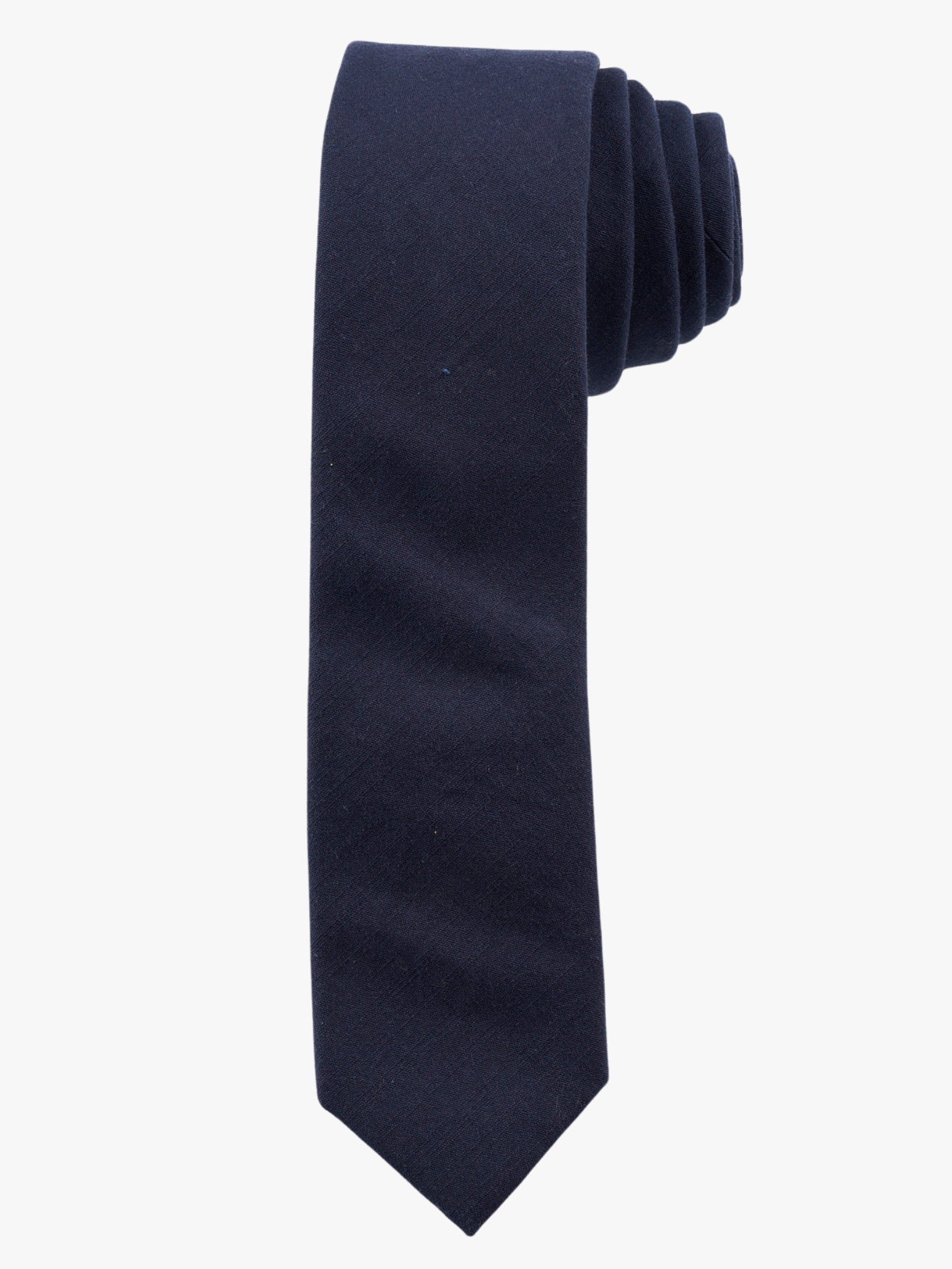 A rolled up navy blue solid-colored cotton necktie for teens, missionaries, men, and women.