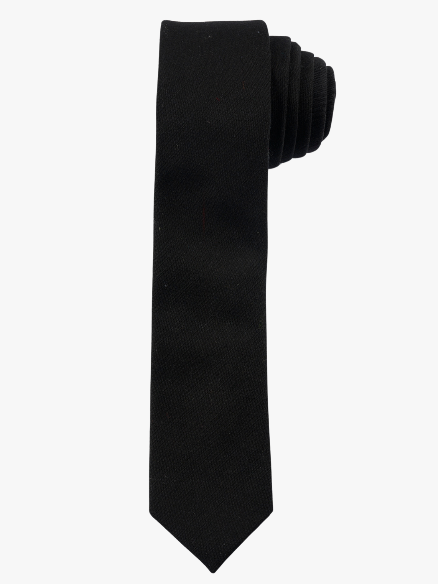 A rolled up pitch black solid-colored cotton necktie for teens, missionaries, men, and women.