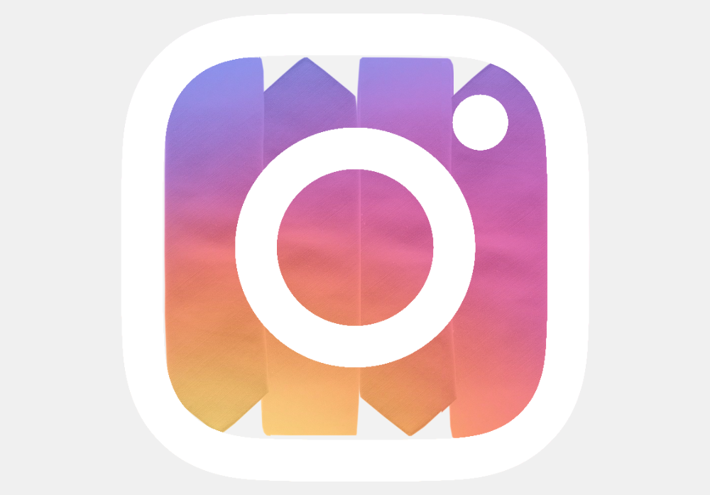 The Instagram logo composed of orange, pink and purple otis and oliver neckties.